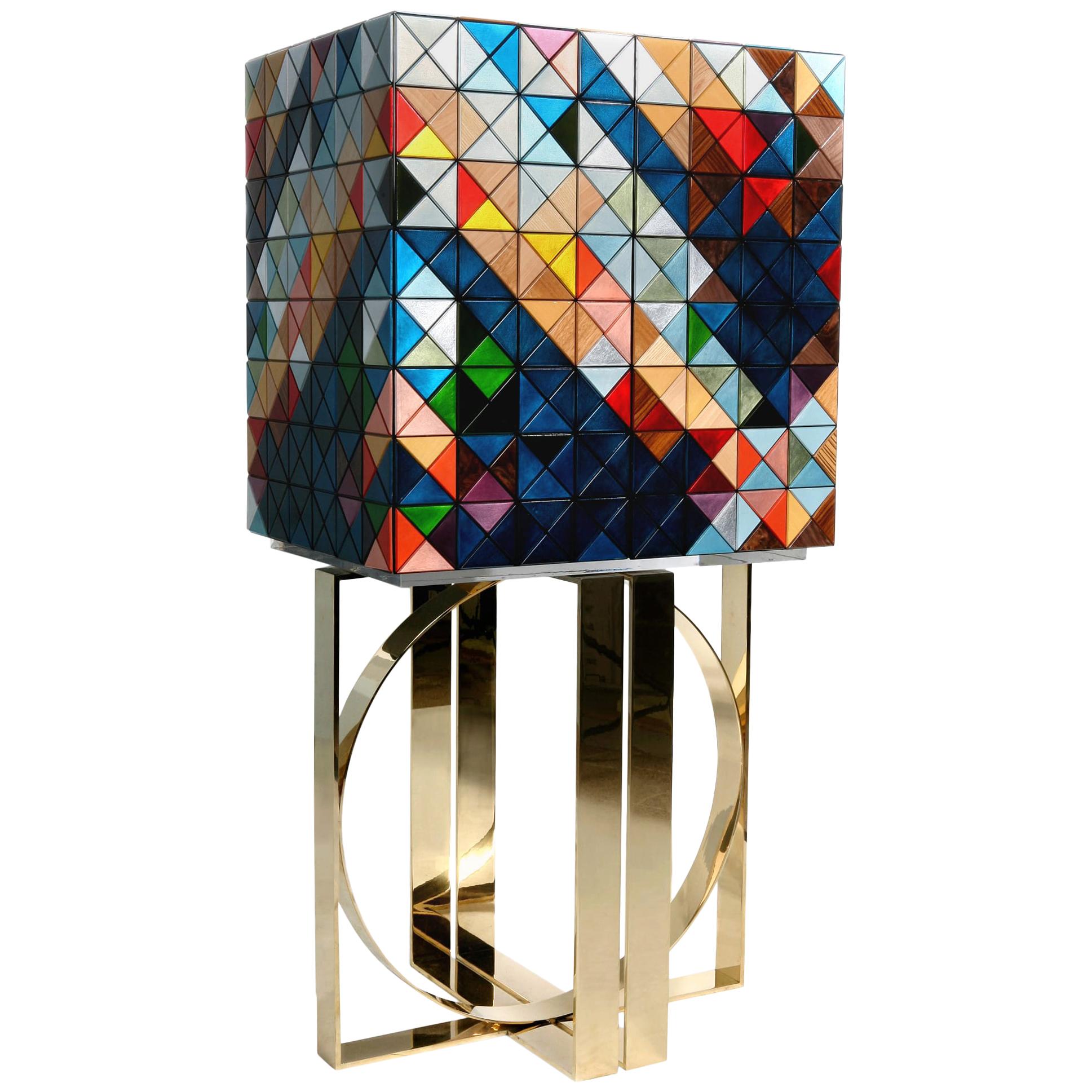 Iconic and unparalleled, the Pixel Cabinet presents a ground-breaking work of pioneering design. This piece carries the dedication and art of those who built it, a variety of traditional production techniques to craft an avant-garde furniture piece