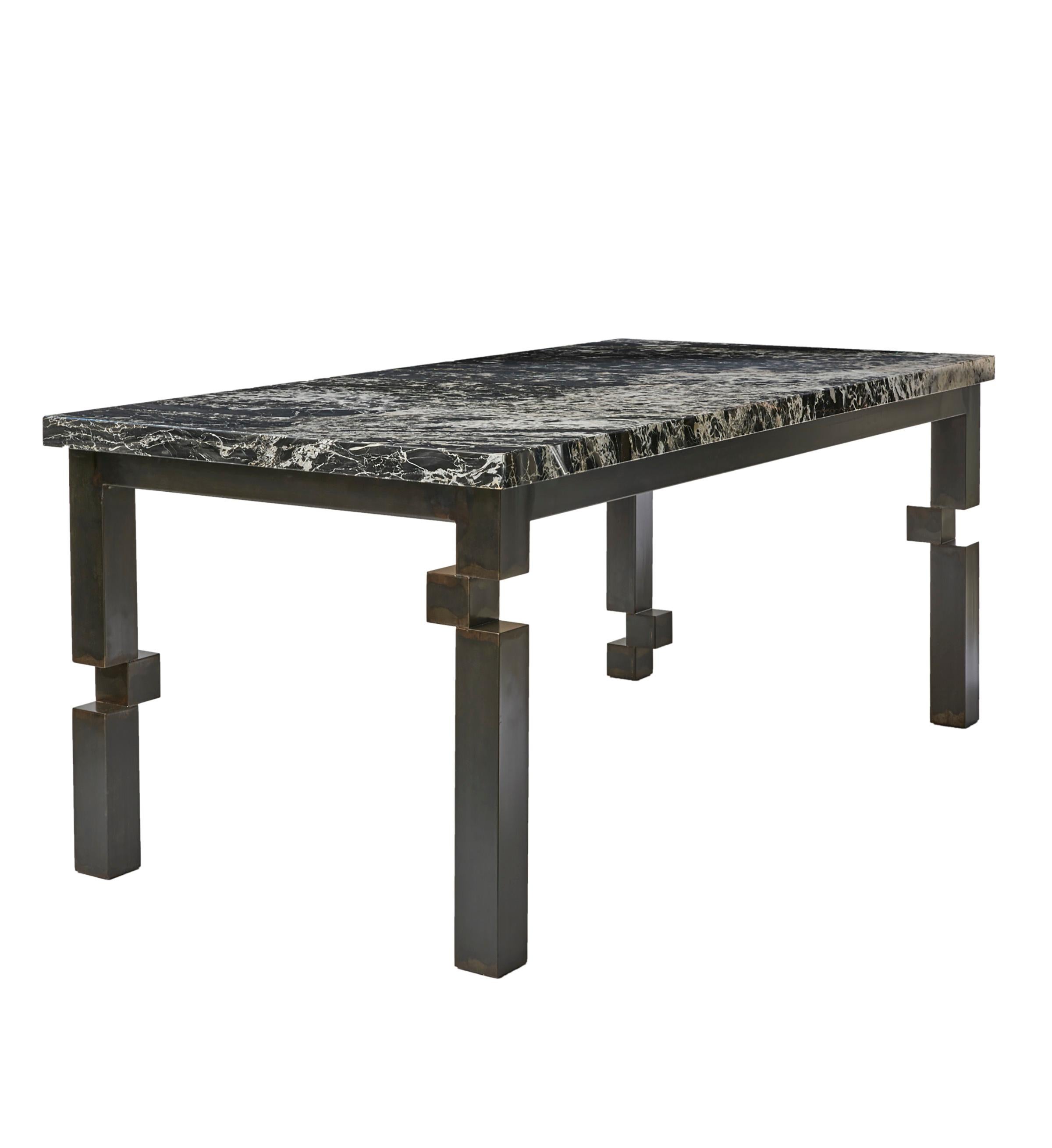 Pixel desk by Morgan Clayhall
Dimensions: D 91.44 x W 142.24 x H 76.2 cm
Materials: Steel tubing, marble. 

The Pixel Desk is designed with creating a whimsical interpretation of deconstructionism in the
breaking apart of the structural