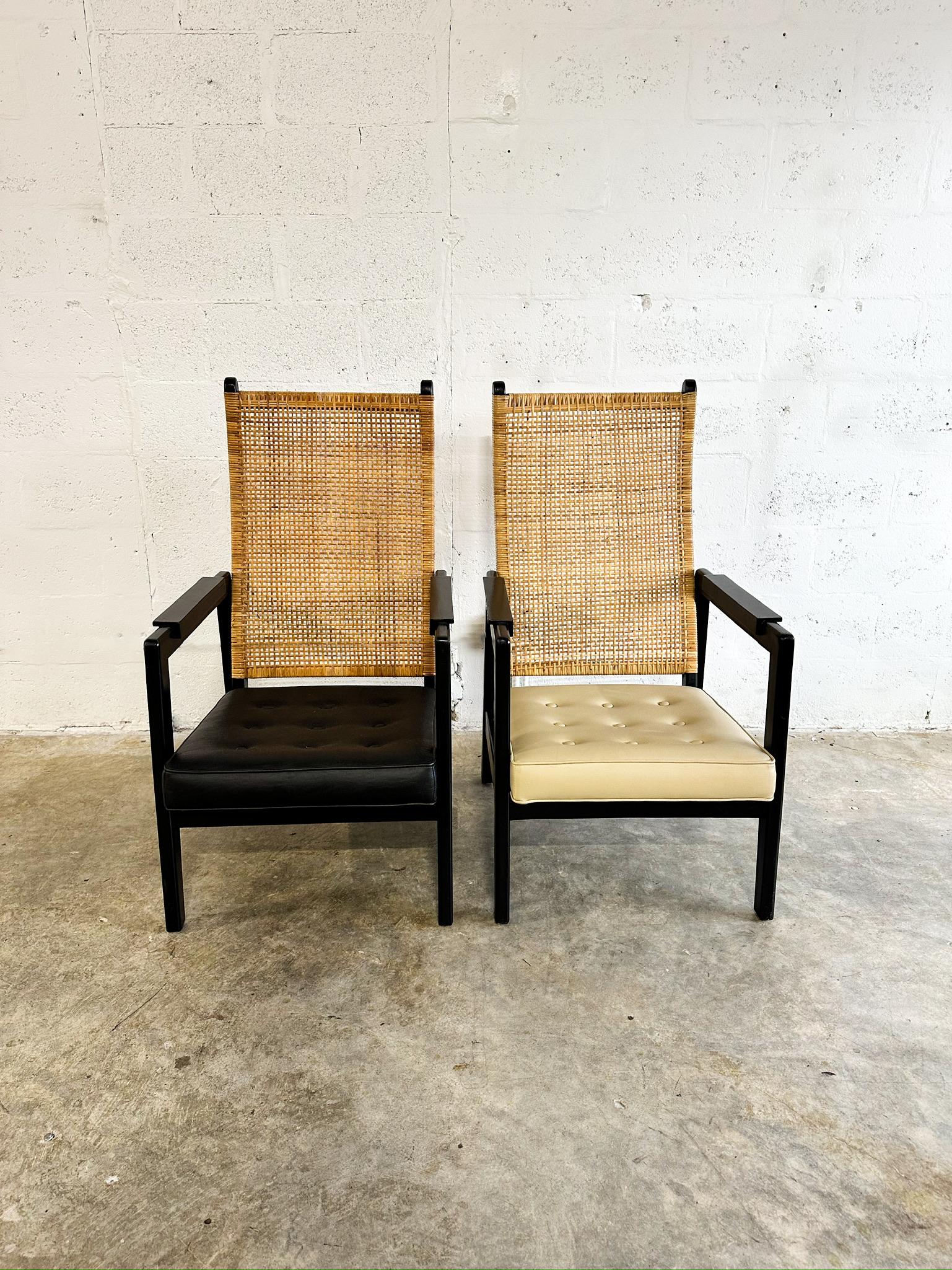 Rattan Highback Lounge Chairs by P.J. Muntendam for Jonkers, Netherlands. One beige and one black. 22.25w 28d 40.5h 15seat