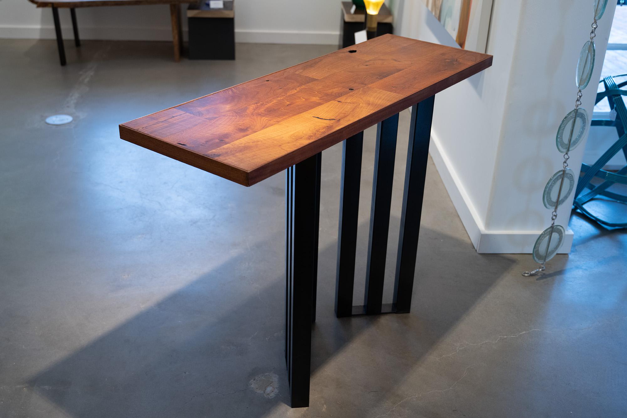 Texas Mesquite wood with steel base

 It’s all about the materials.

That simple thought keeps me grounded in the moment. It’s how I stay focused on my art and approach to creating furniture that solves design challenges and pleases my