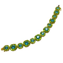 Bracelet design en cristal plaqué or signé PJM