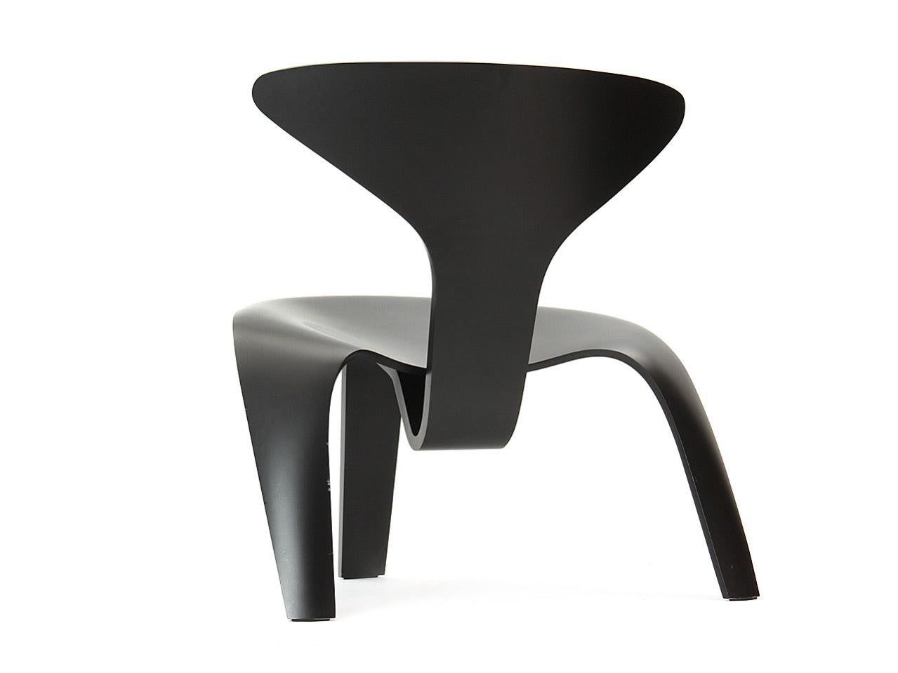 A 'PK 0' low, graphic black lacquered laminated beech lounge chair, in a limited production of 600. Chairs numbered 311, 336, 338, and 339.