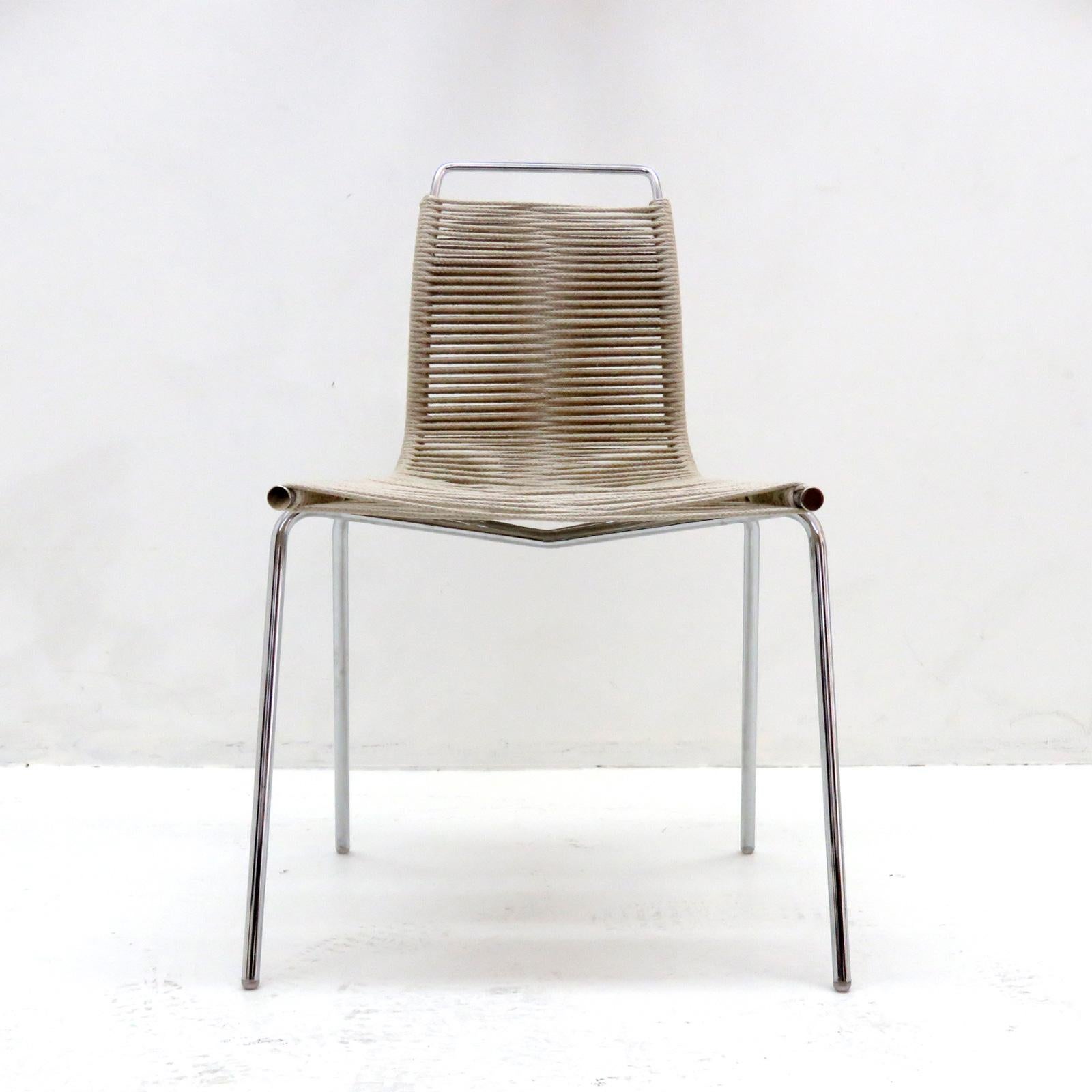 wonderful dining chair PK-1, designed by Poul Kjærholm in 1955, in chrome plated tubular steel with flag halyard.