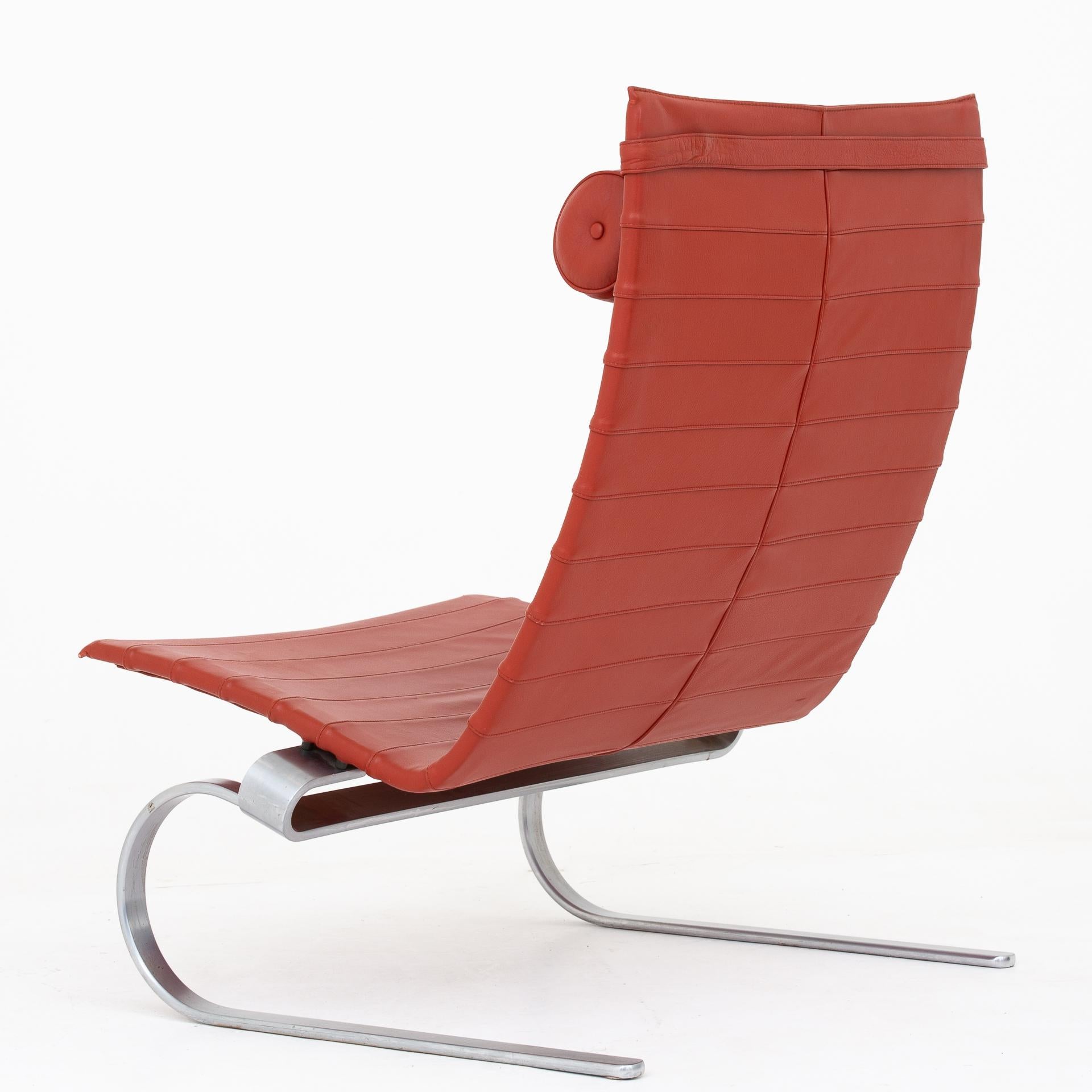 PK 20 - easy chair with reddish brown leather on frame of steel. Poul Kjærholm / Fritz Hansen.
