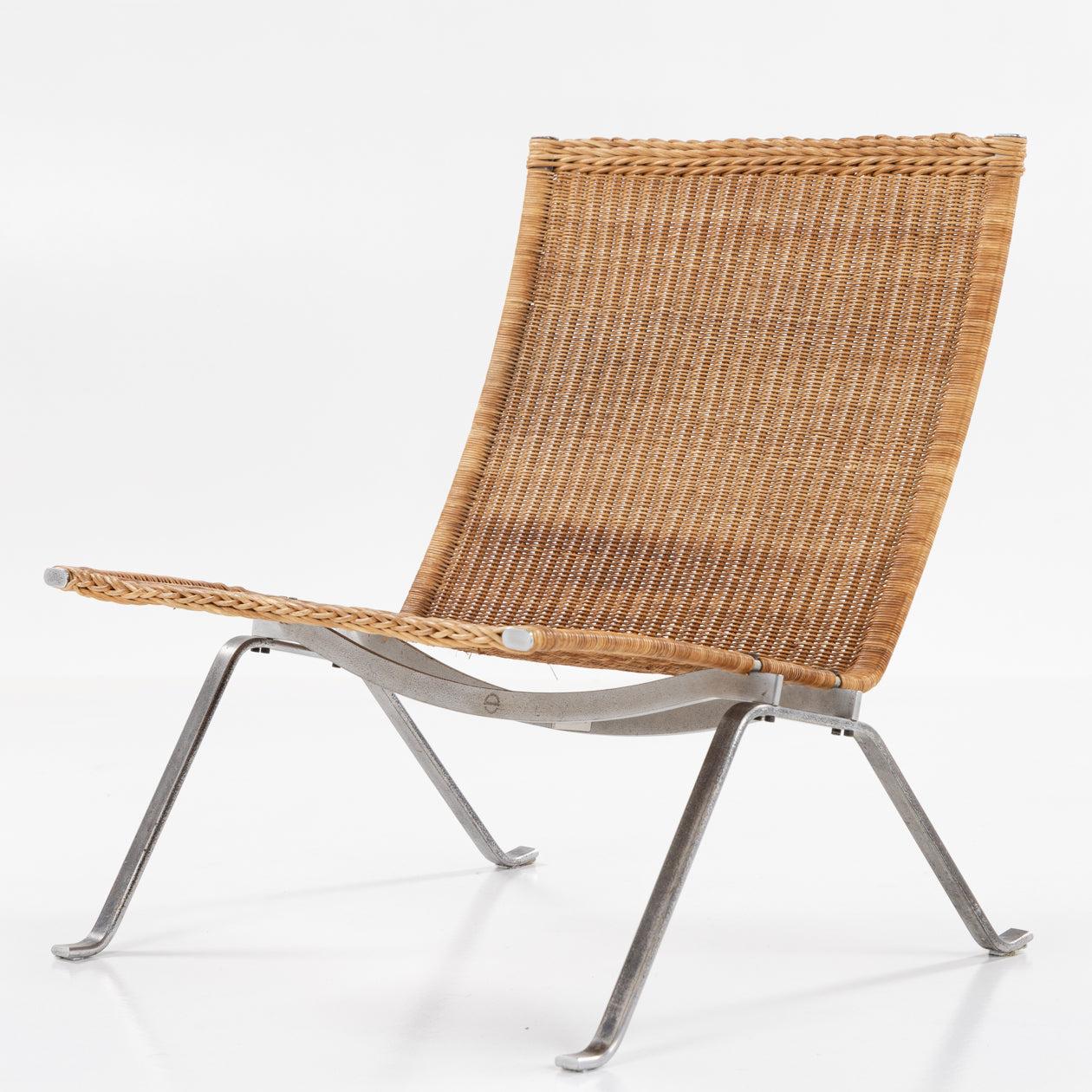 PK 22 - Armchair in patinated woven cane. Labelled from manufacturer. Fritz Hansen.