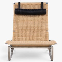PK 24 - Chaise longue in wicker by Poul Kjærholm