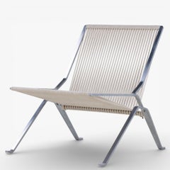PK 25 - Pair of easy chairs in flag halyard by Poul Kjærholm