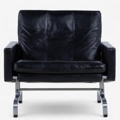 PK 31/1 - Armchair in black leather by Poul Kjærholm