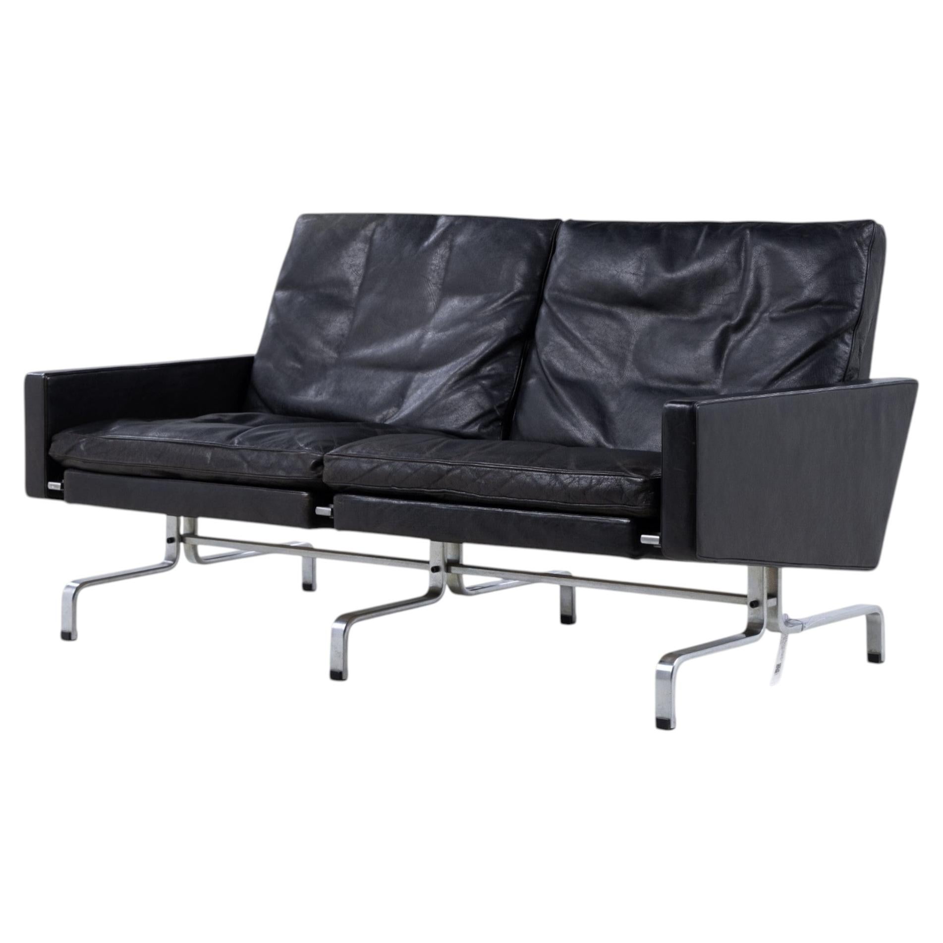 PK 31/2 - 2 pers. sofa in black leather by Poul Kjærholm