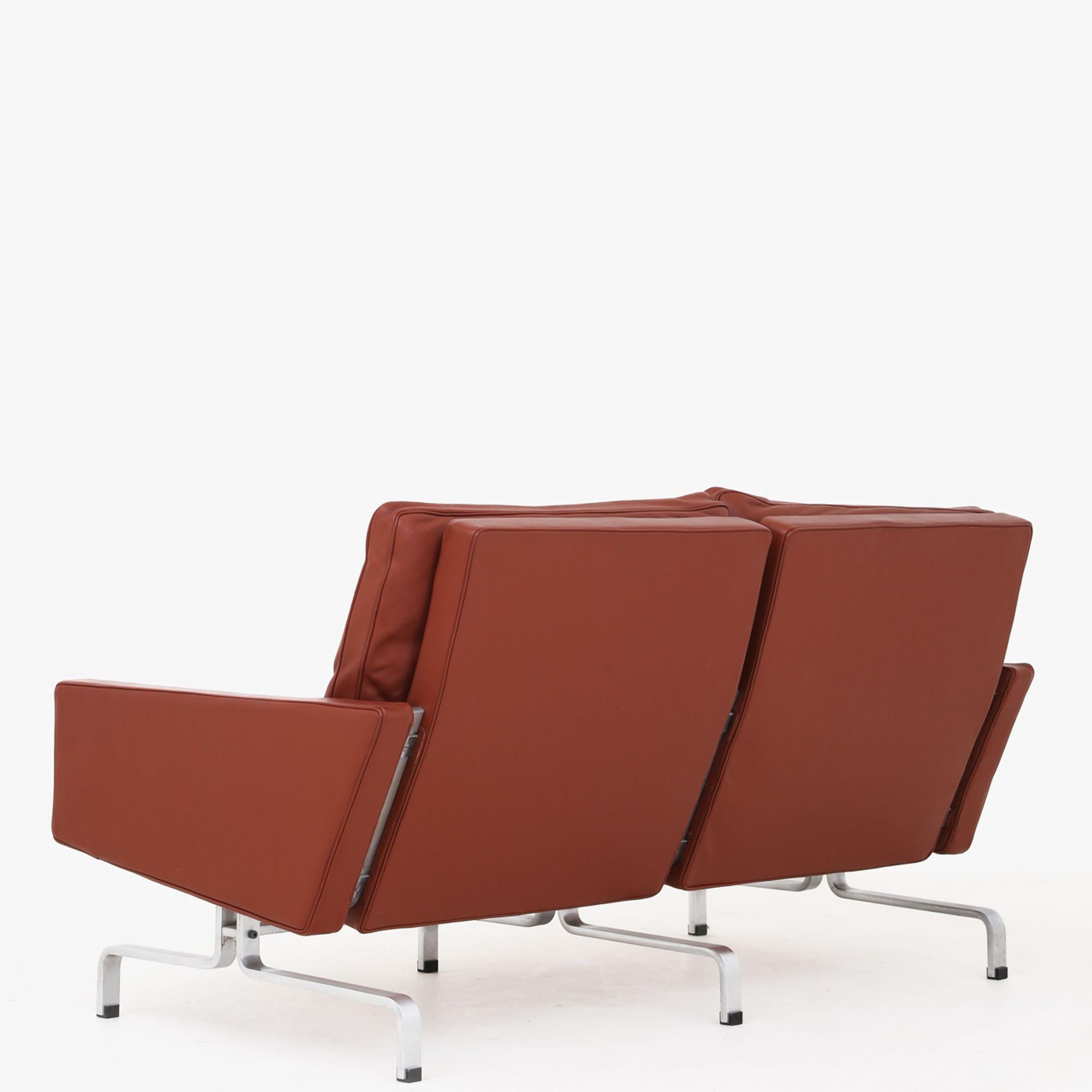 PK 31/2 - 2 seater sofa in red semi-aniline leather on steel frame. Poul Kjærholm / E. Kold Christensen.