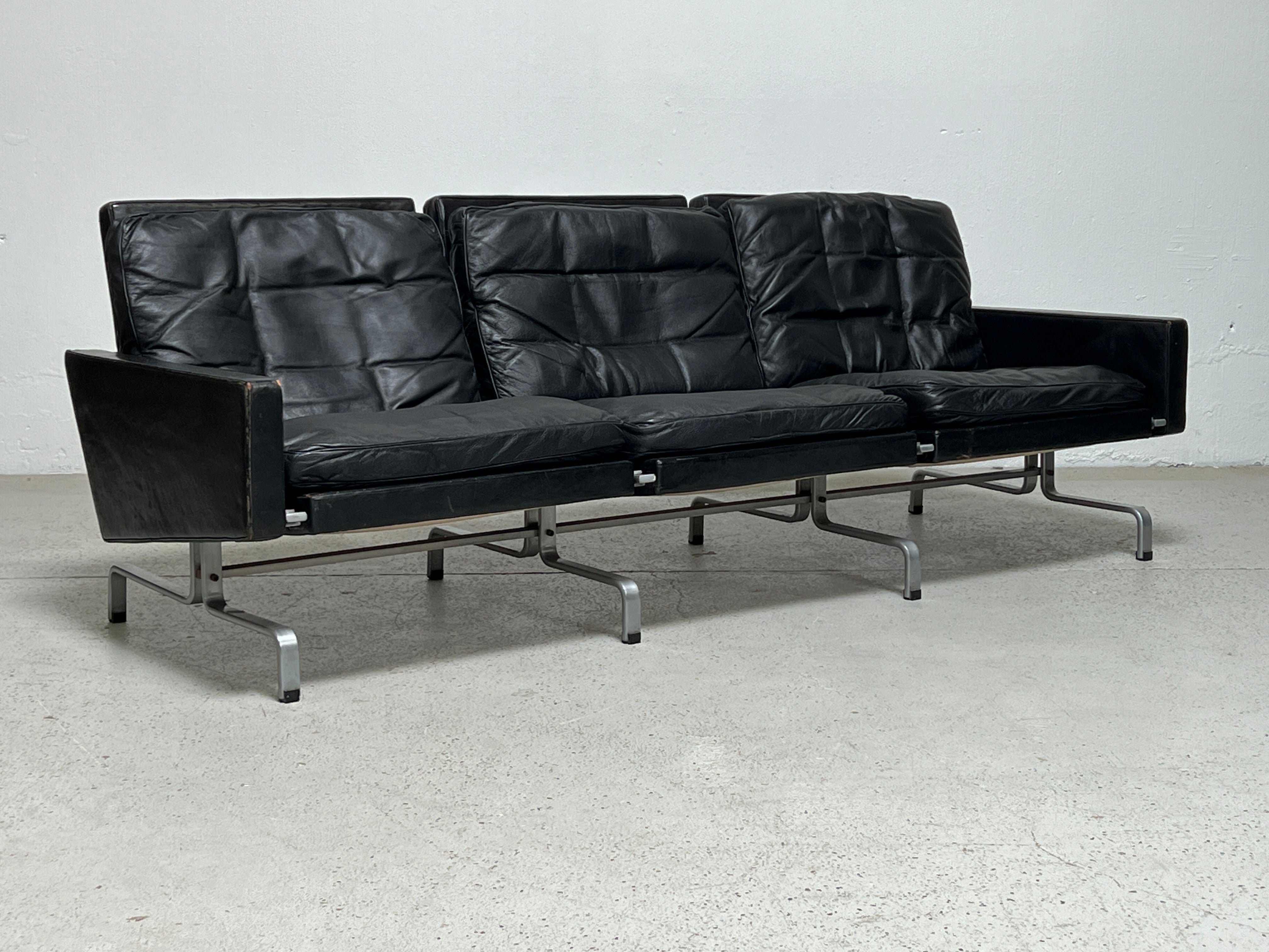 PK-31/3 sofa by Poul Kjærholm for E. Kold Christensen in original patinated black leather.