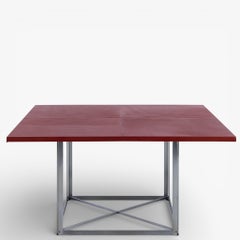 PK 40 - Dining table with red leather by Poul Kjærholm