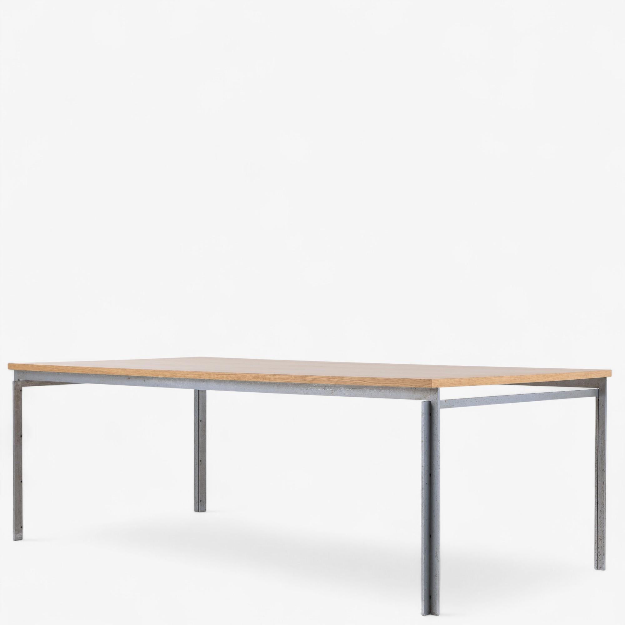 PK 51 - Large desk/work table with frame in patinated matt chrome-plated steel and newer oak top. Designed in 1957 by Poul Kjærholm. Stamped from manufacturer E. Kold Christensen. 