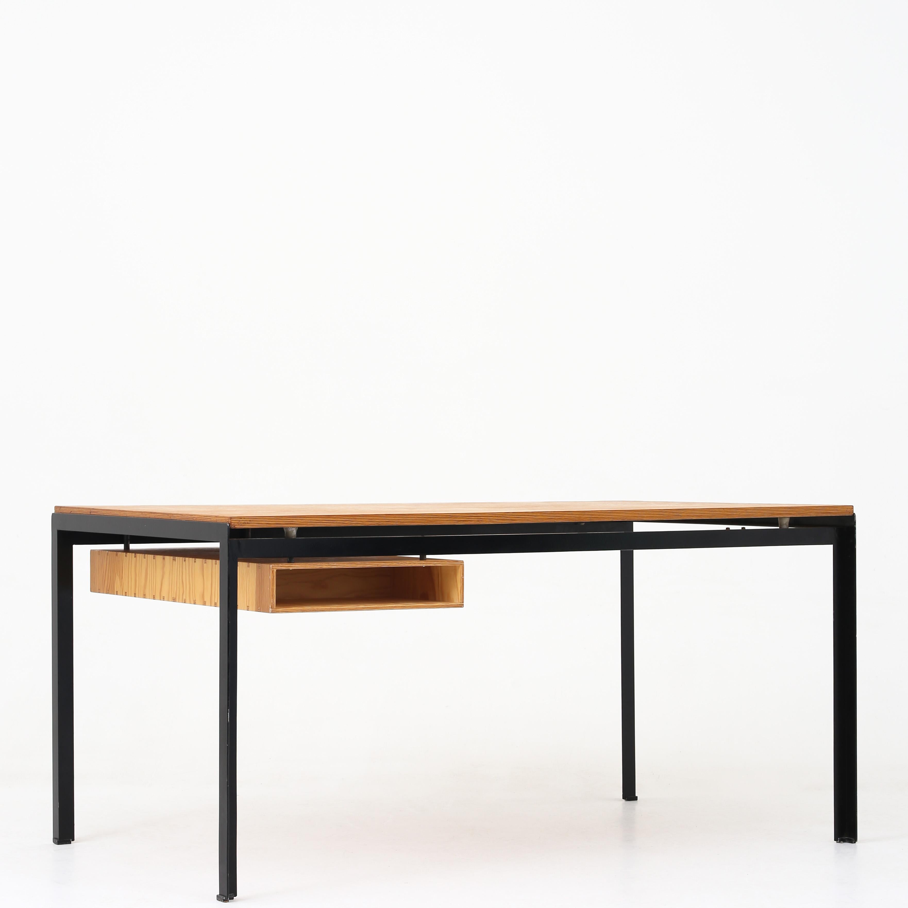 Poul Kjærholm PK 52 - 'Student's Table' with top and drawer module in patinated pine on black angle iron frame. Maker RUd. Rasmussen.
