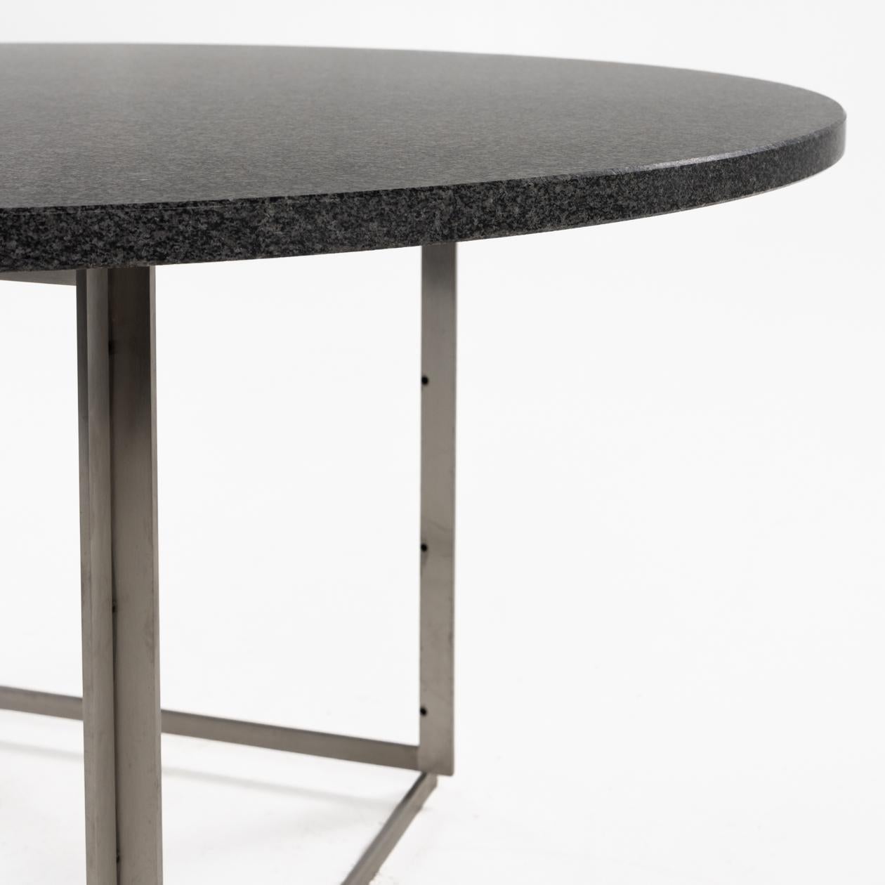 PK 54 dining table with granite by Poul Kjærholm / Fritz Hansen