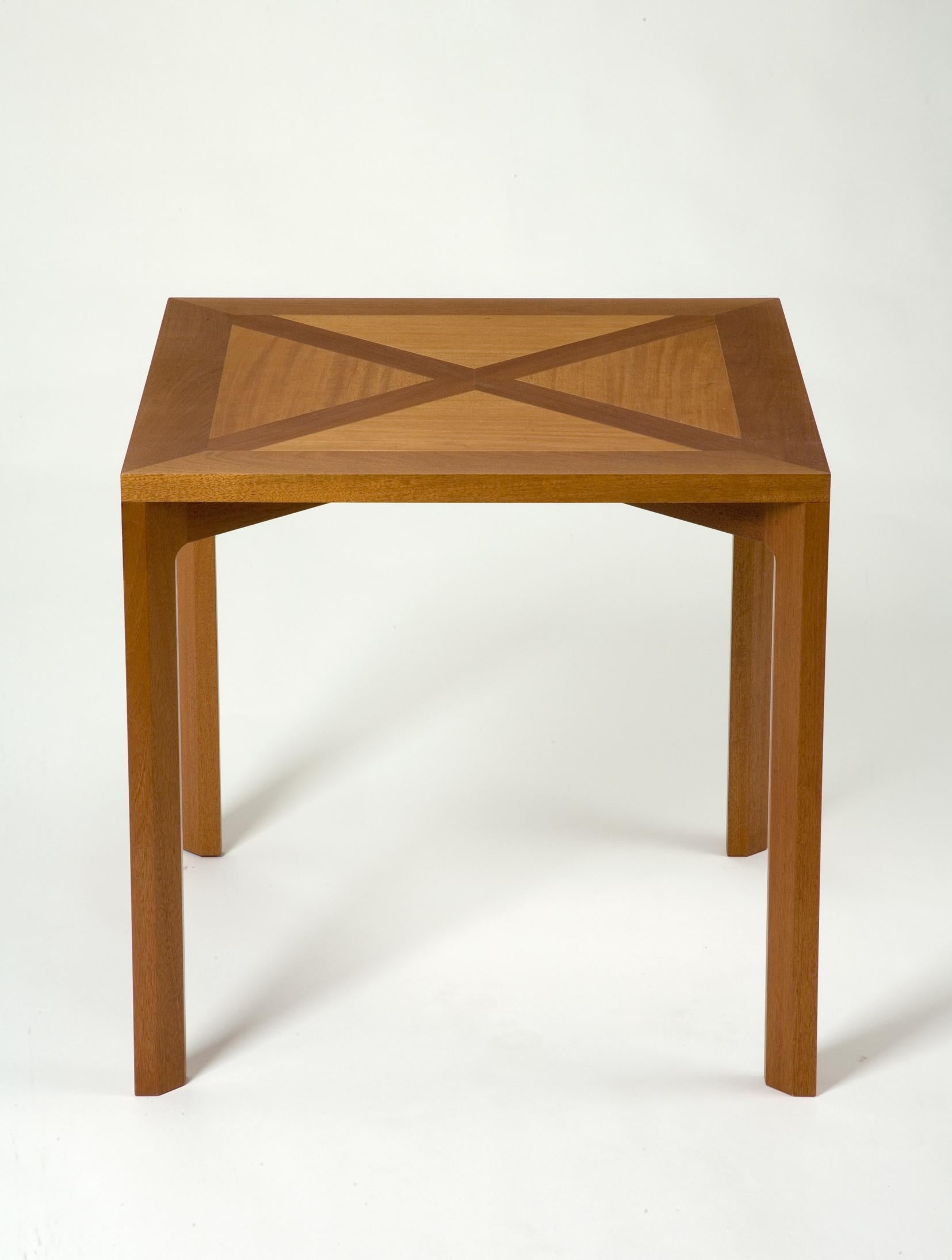 PK 70 dining table in mahogany. Designed by Poul Kjærholm, Denmark, 1972. Adapted from his tables for Restaurant Den Sorte Ravn. Produced by PP Møbler, Denmark, circa 1990.
 