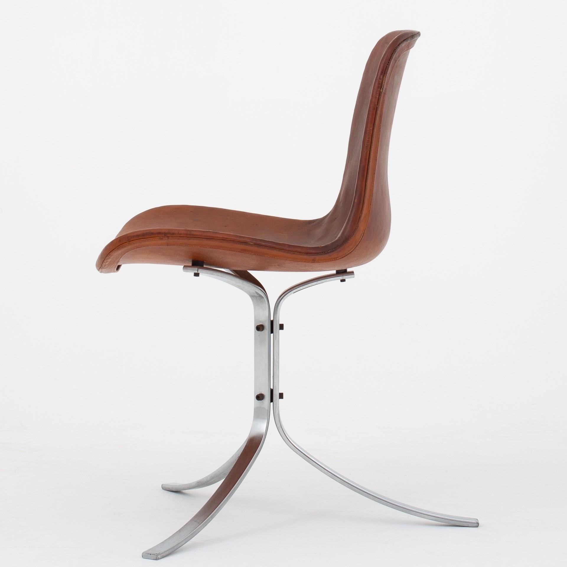 PK 9 - Chair in original, patinated cognac leather with frame in matt chromed steel. Designed in 1960. Maker E. Kold Christensen.