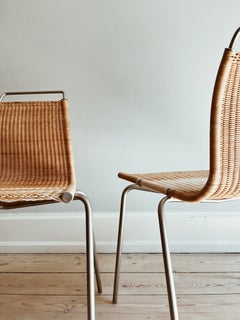 PK1 rattan chairs by Poul Kjærholm