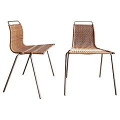 Sedie in rattan PK1 di Poul Kjærholm