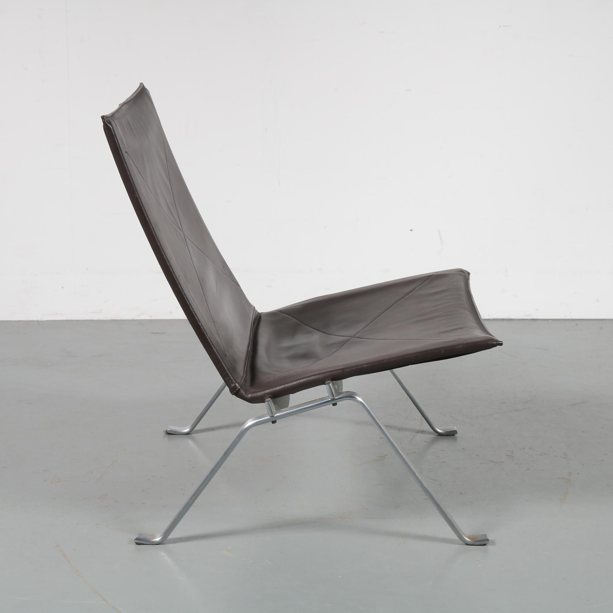 A stunning PK22 lounge chair, designed by Poul Kjaerholm, manufactured by E. Kold Christensen in Denmark around 1960.

The chair has a beautiful chrome-plated metal base. It is upholstered in high quality thick brown leather, all original. This