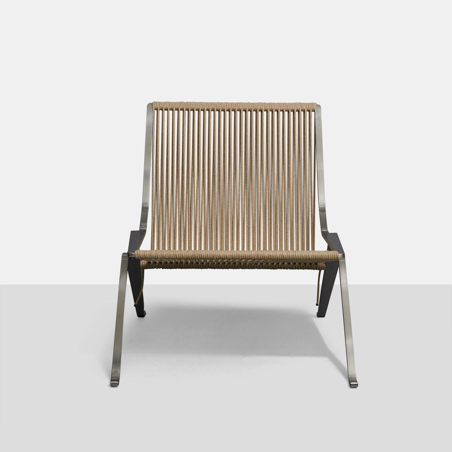 A PK-25 lounge chair with matt chromed spring steel frame made using a single piece of steel, mounted with woven flag halyard. Designed in 1951. Produced by Fritz Hansen, stamped accordingly on the frame.
  