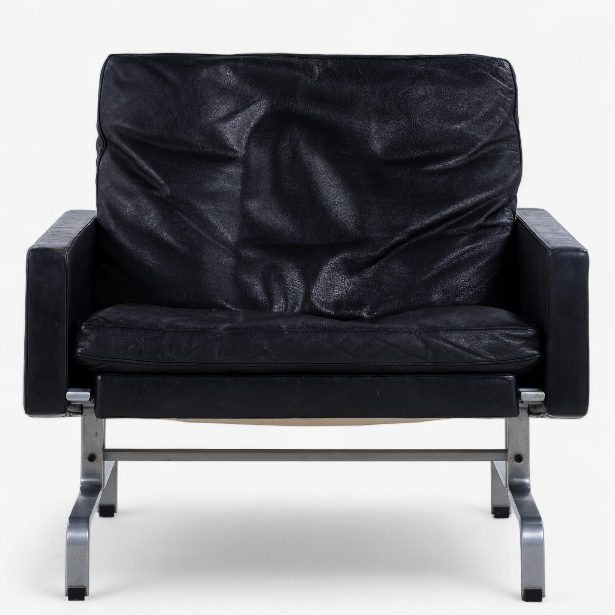 PK 31/1 - Sessel aus patiniertem schwarzem Leder mit Stahlgestell. Gestempelt vom Hersteller E. Kold Christensen und entworfen von Poul Kjærholm.