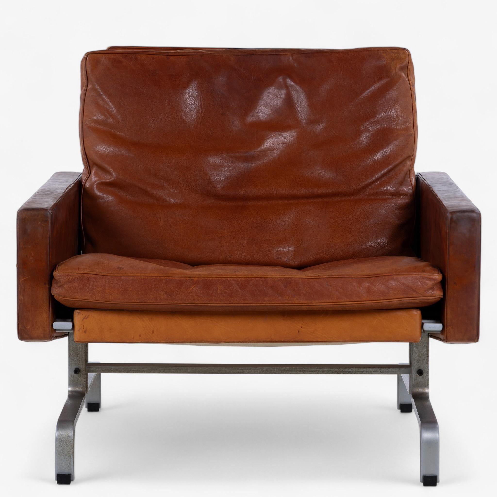 PK 31/1 - Sessel aus patiniertem cognacfarbenem Leder mit Stahlgestell. Entworfen von Poul Kjærholm, hergestellt von E. Kold Christensen.