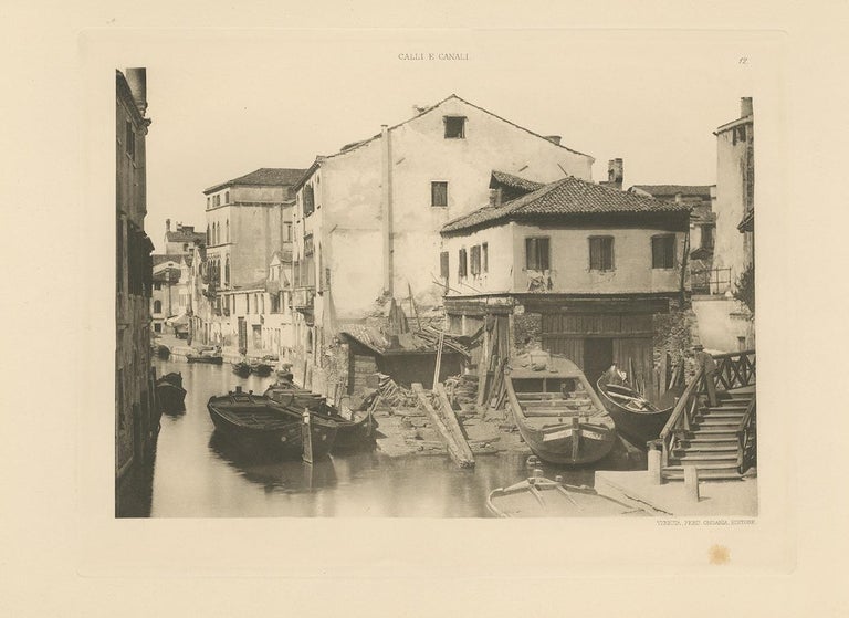 Photogravure of a boatbuilding yard on the Bottesela canal at the SS. Apostoli, Venice. This print originates from 'Calli e Canali - Streets and Canals in Venice edited by Ferdinand Ongania'. Published, circa 1890.