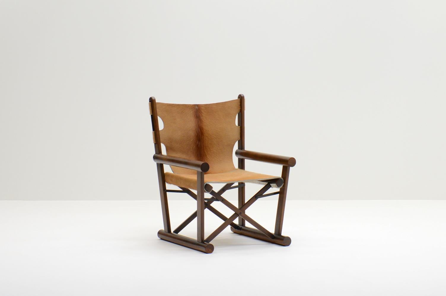 PL22 chair by Carlo Hauner & Martin Eisler for OCA, Brazil 60s. Solid tropical hardwood frame and reupholstered in cow hide leather. Frame has a nice patina and in very good vintage condition. 

Request a quote for the latest shipping rates.