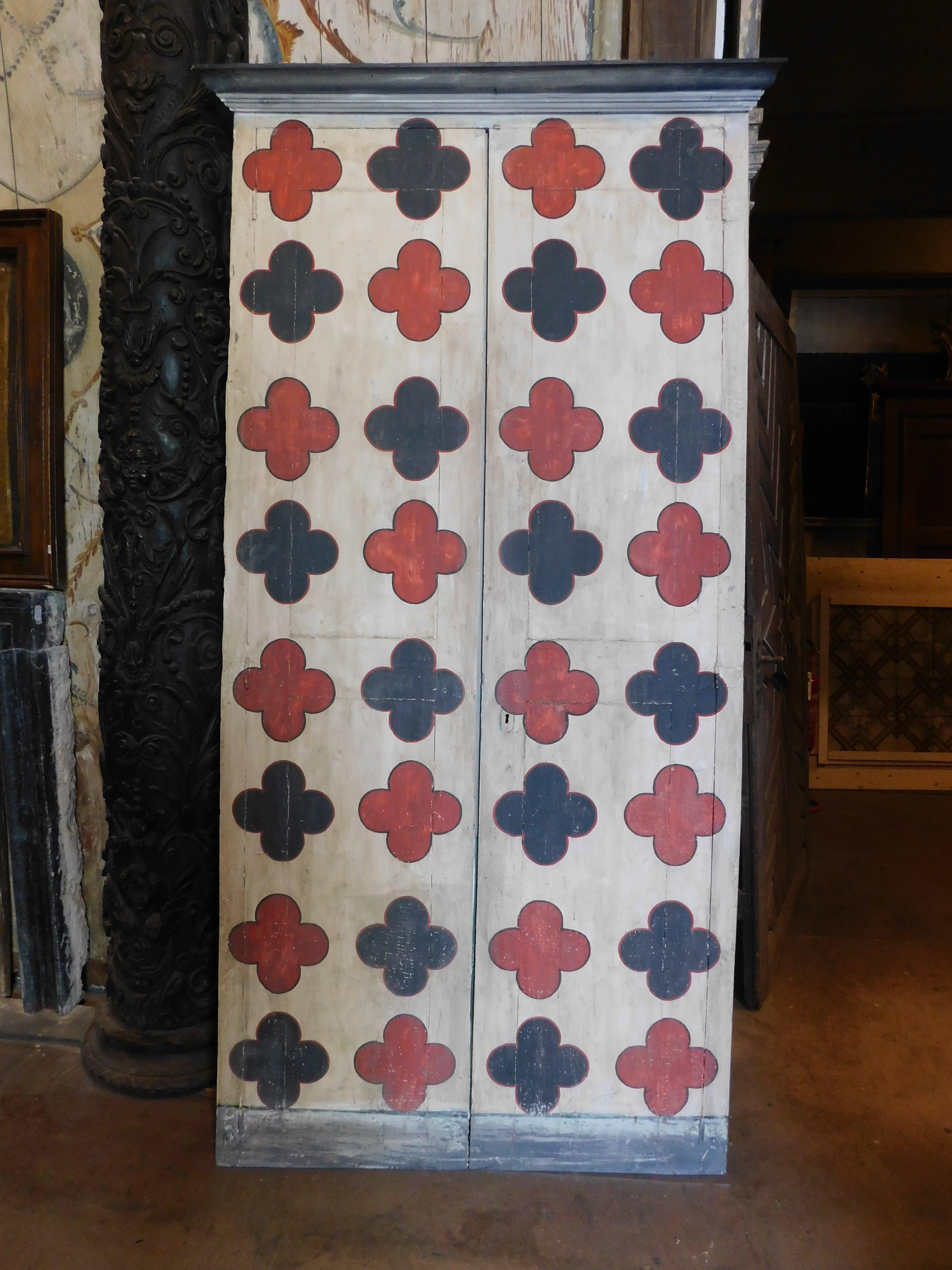 Vintage old Placard, wall wardrobe, cupboard in solid wood, hand painted with red and black optical motif on a cream background, lacquered but simple back, built in Italy in the mid-20th century to close a niche in the wall, with great visual