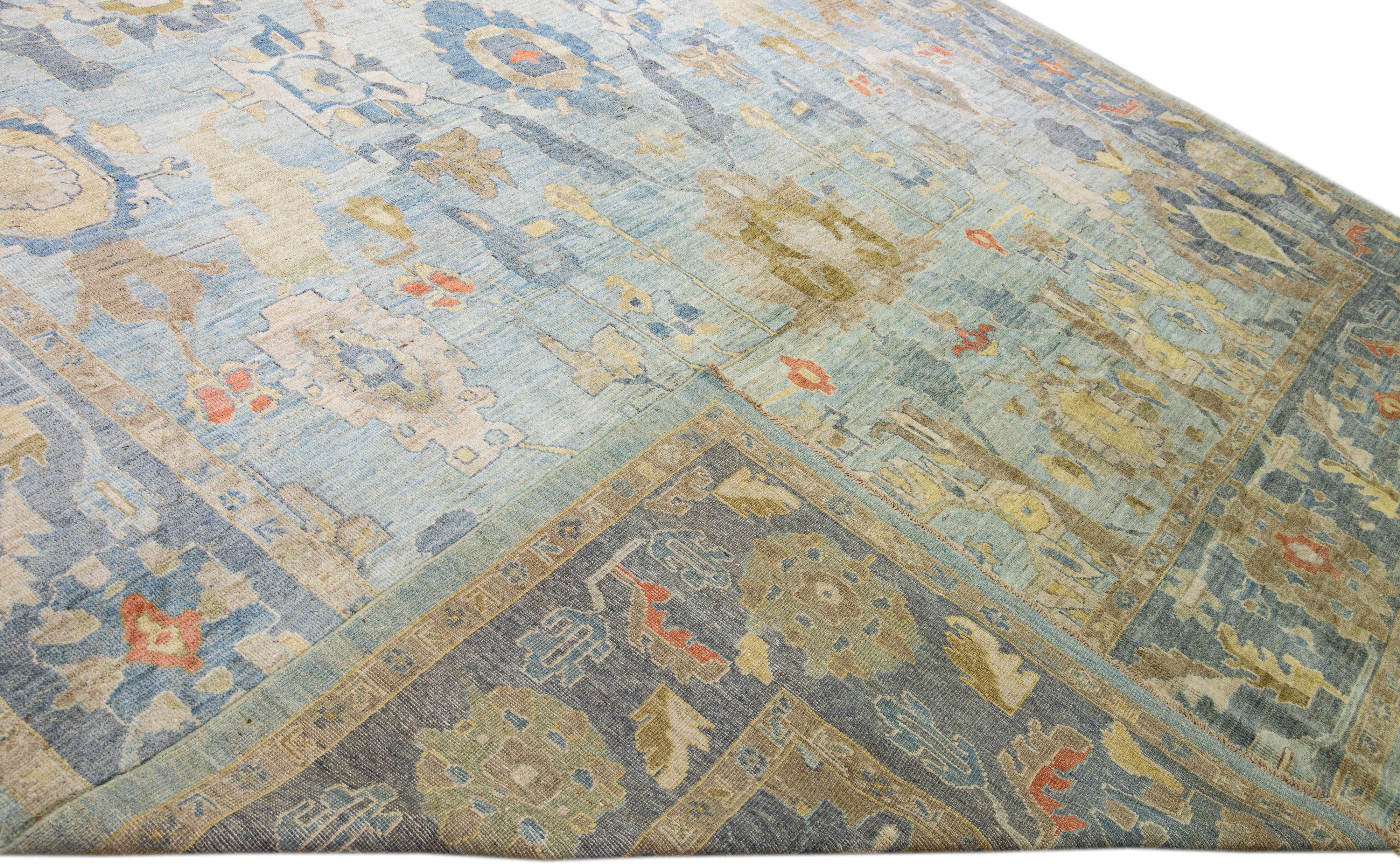 Place size Beautiful modern Sultanabad hand-knotted wool rug with a blue field. This Sultanabad rug has multicolor accents in a gorgeous all-over classic floral pattern design.

This rug measures: 13'2