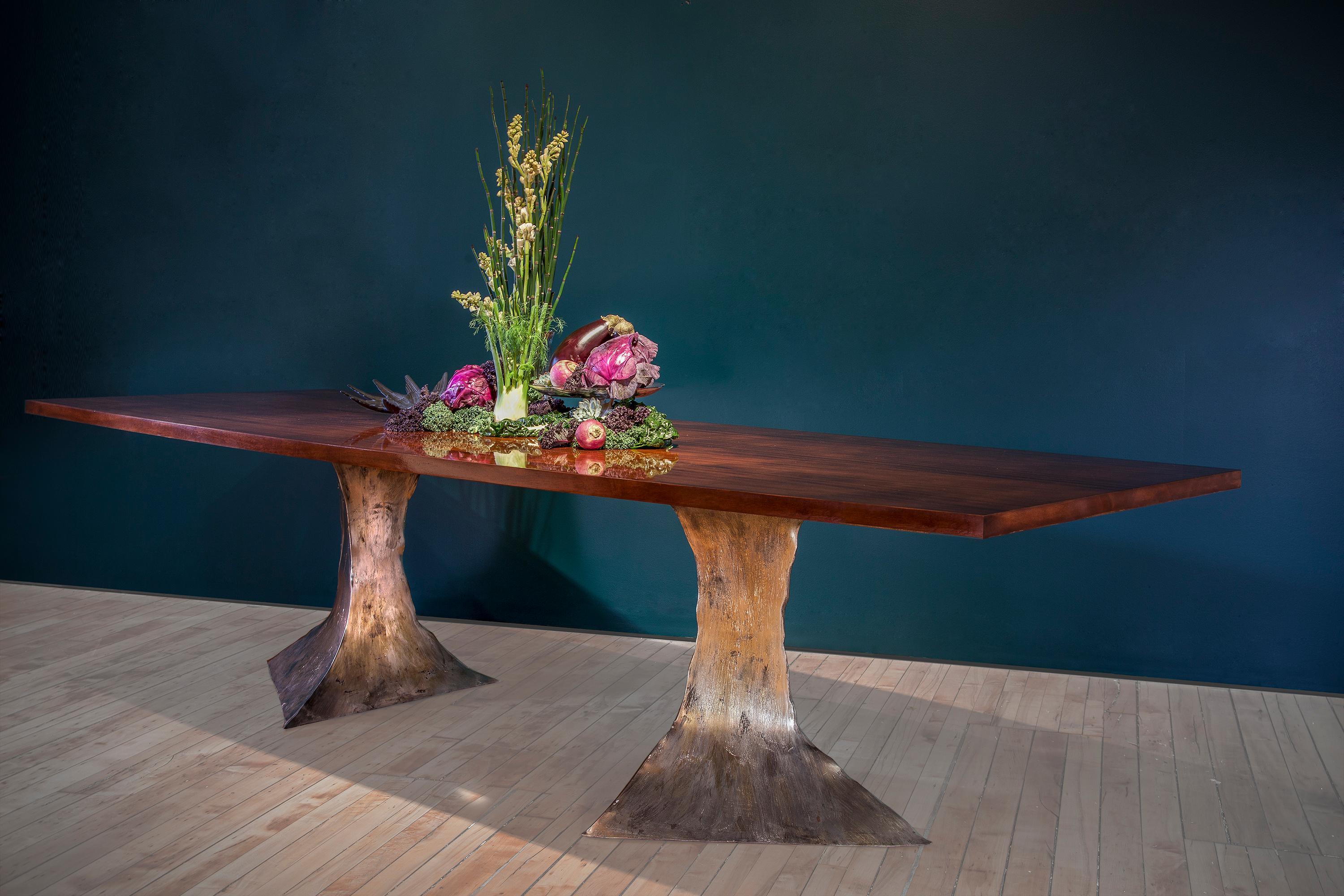 Placid dining table by Gentner Design
Dimensions: D 304 x W 116 x H 76 cm
Materials: walnut, pewter

Gentner Design
Rooted in a language of sculpture, character defining details, and world renowned craftsmanship, the work is found at the
