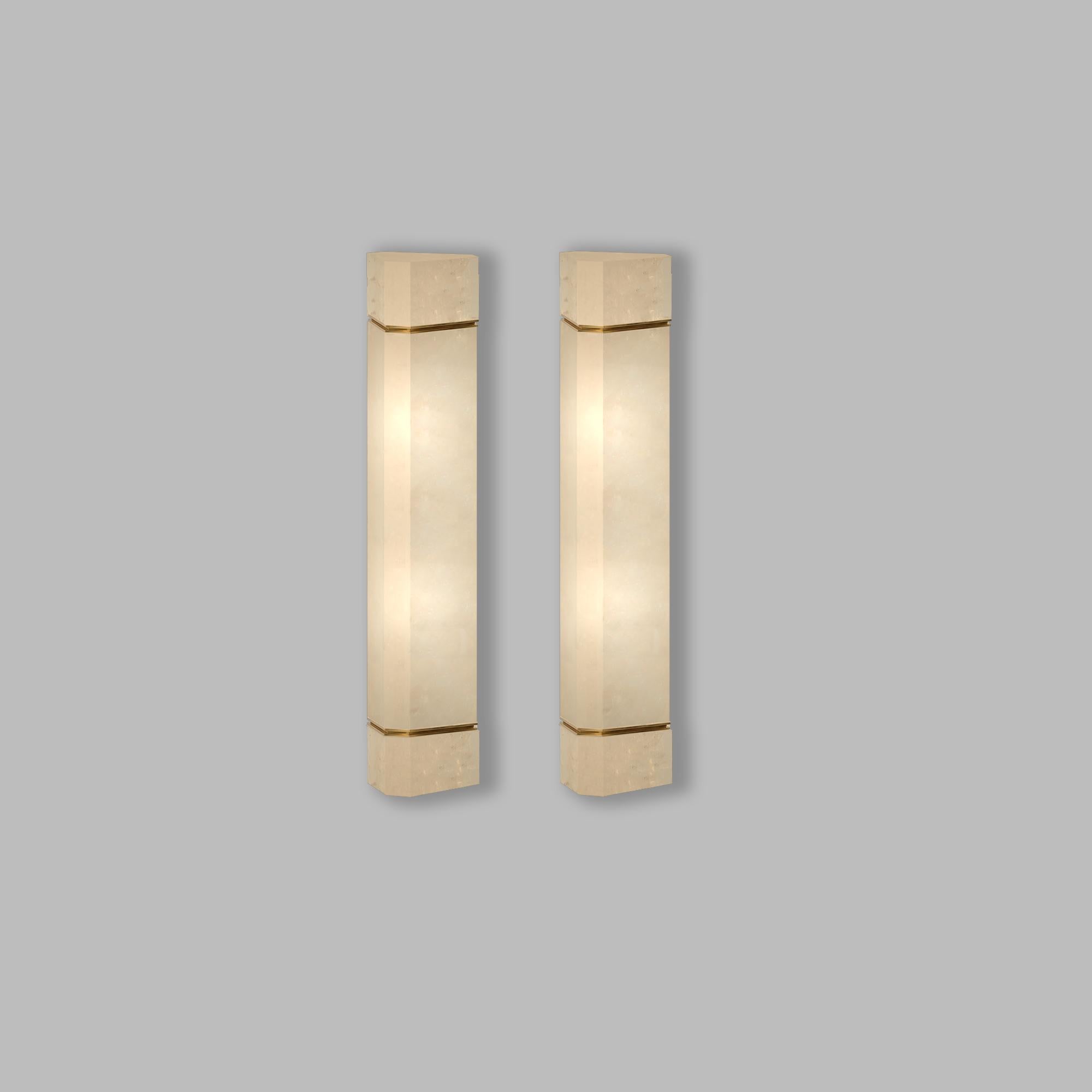 Pair of carved rock crystal sconces with polish brass inserts decorations, created
by Phoenix.
Custom size and finish upon request.