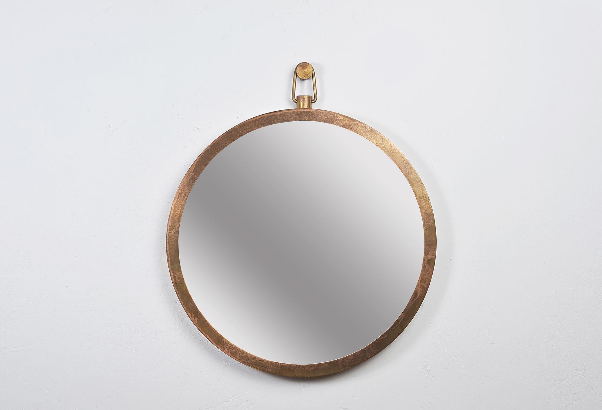 “Plain” brass frame mirror by Lukasz Friedrich.
Dimensions: D 65 cm.
Materials: Patinated brass, mirror.

Comes with wall fixation.

Lukasz Friedrich (born 1980), lives and works in Warsaw. He is a self-taught
Designer and craftsman. Lukasz