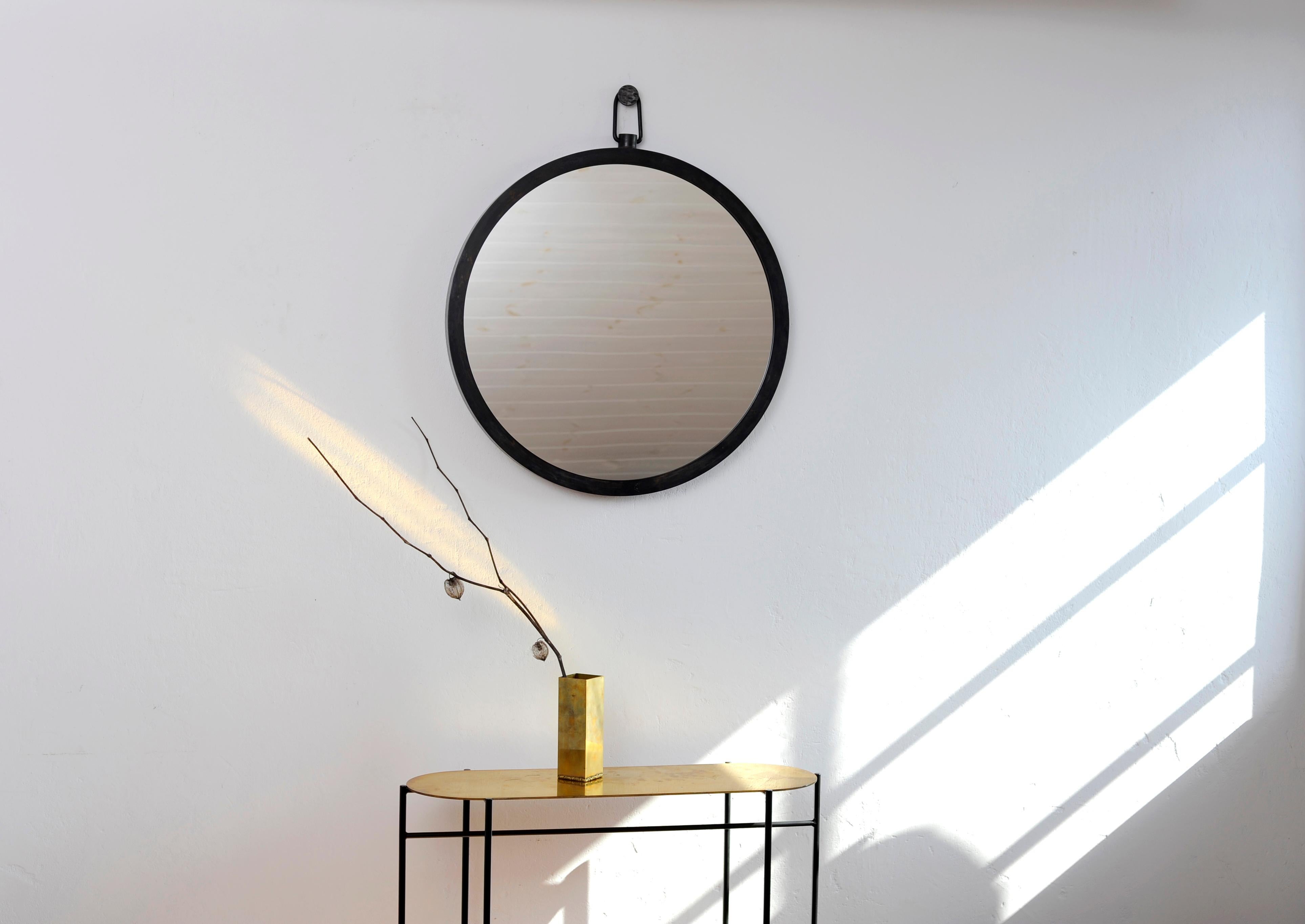 “Plain” mirror by Lukasz Friedrich.
Dimensions: D 65 cm.
Materials: Steel, mirror.
Also available in black patina on steel, stainless steel, dimensions can be customized.

Comes with wall fixation.

Lukasz Friedrich (born 1980), lives and