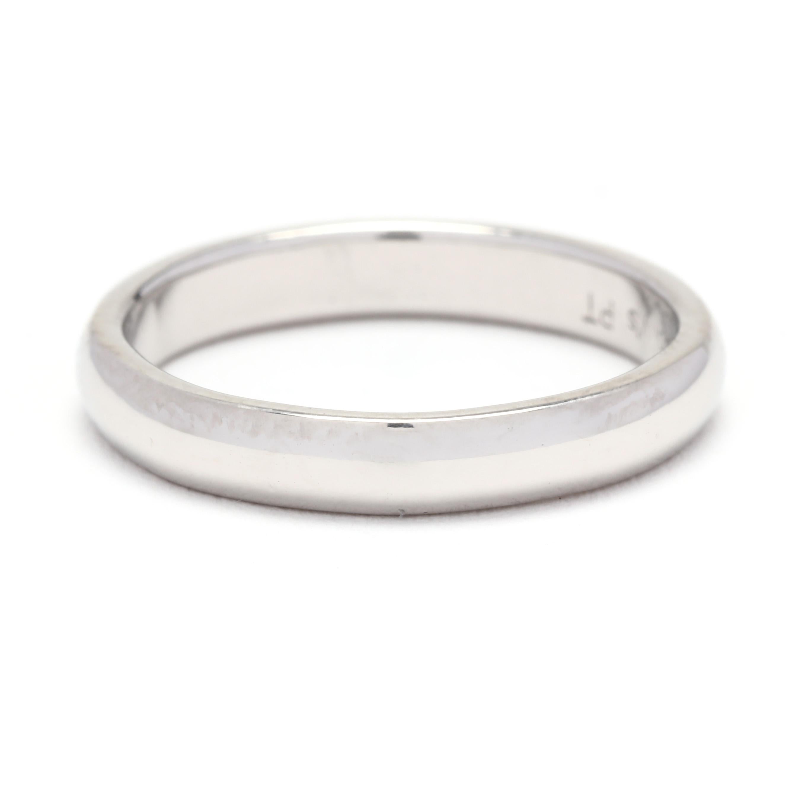 This classic and timeless 3mm Plain Wedding Band exudes elegance and sophistication. Crafted in platinum, this wide band is perfect for stacking and is a size 5.25. An understated, simple design, this plain platinum band is sure to be a treasured