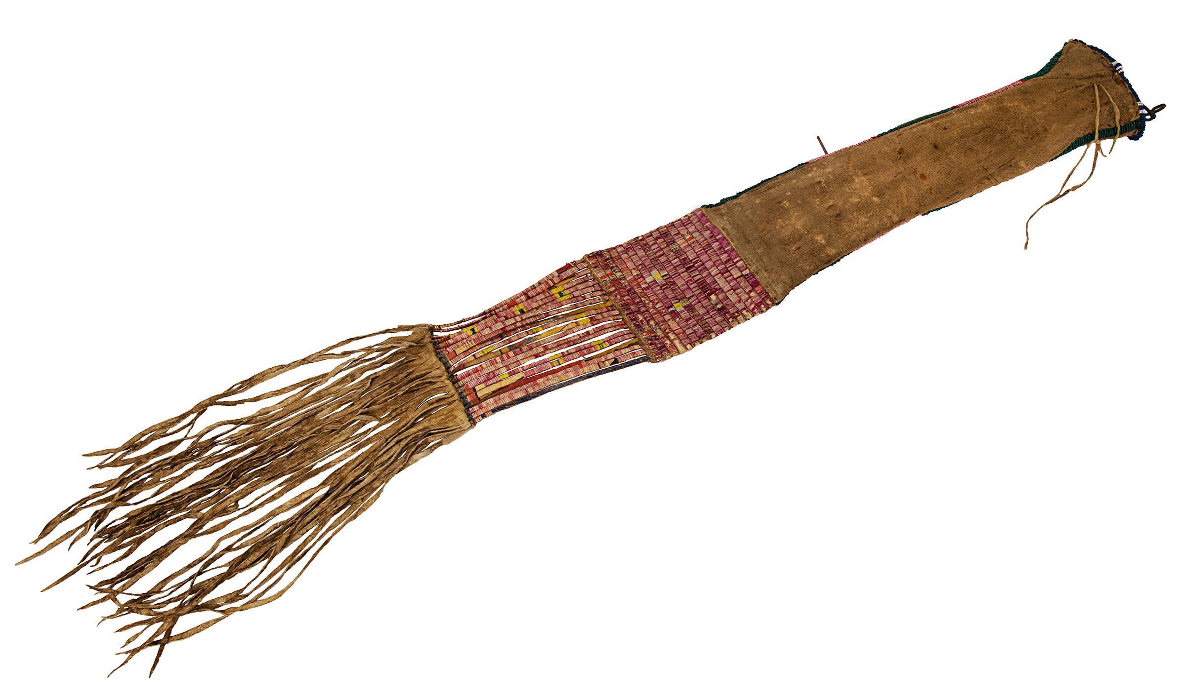 Plains Tobacco bag, circa 1850-1880, native tanned elk or buckskin with a quill work panel with pictorial cross elements, trade beads along the opening and edge in pink, red, green, blue and white, fringed at the bottom.

The Northern Plains