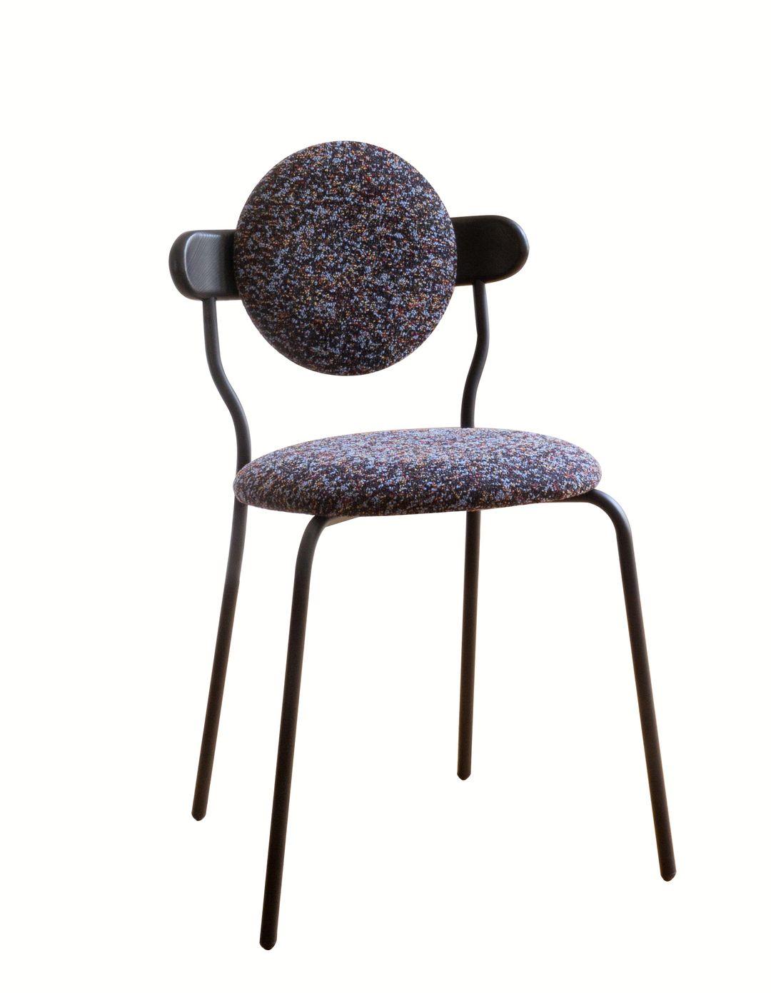 Planet is an upholstered chair inspired by the distinctive silhouette of planet Saturn. The upholstered seat and back ensures a high level of comfort, but Planet chair remains a featherweight at only six kilos for practical use every day.

It is
