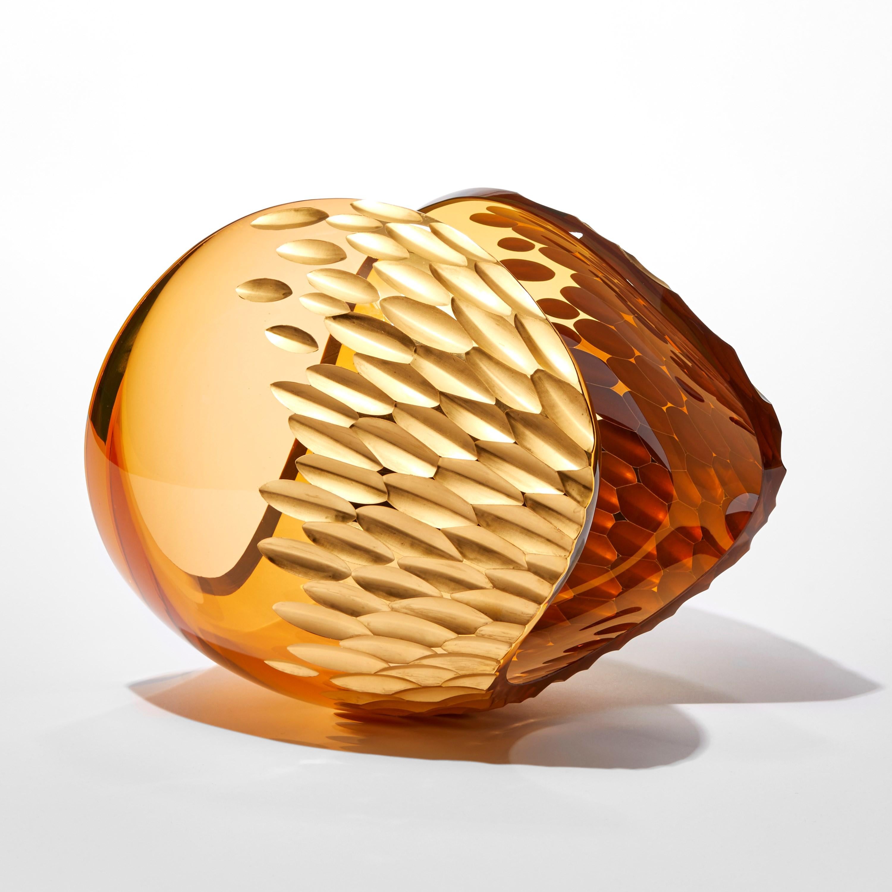 'Planet in Amber Gold' is a unique artwork by the Swedish artist and designer, Lena Bergström. It is from an ongoing collection of works called 'Planets', which Bergström has revisited several times throughout her extensive and highly revered
