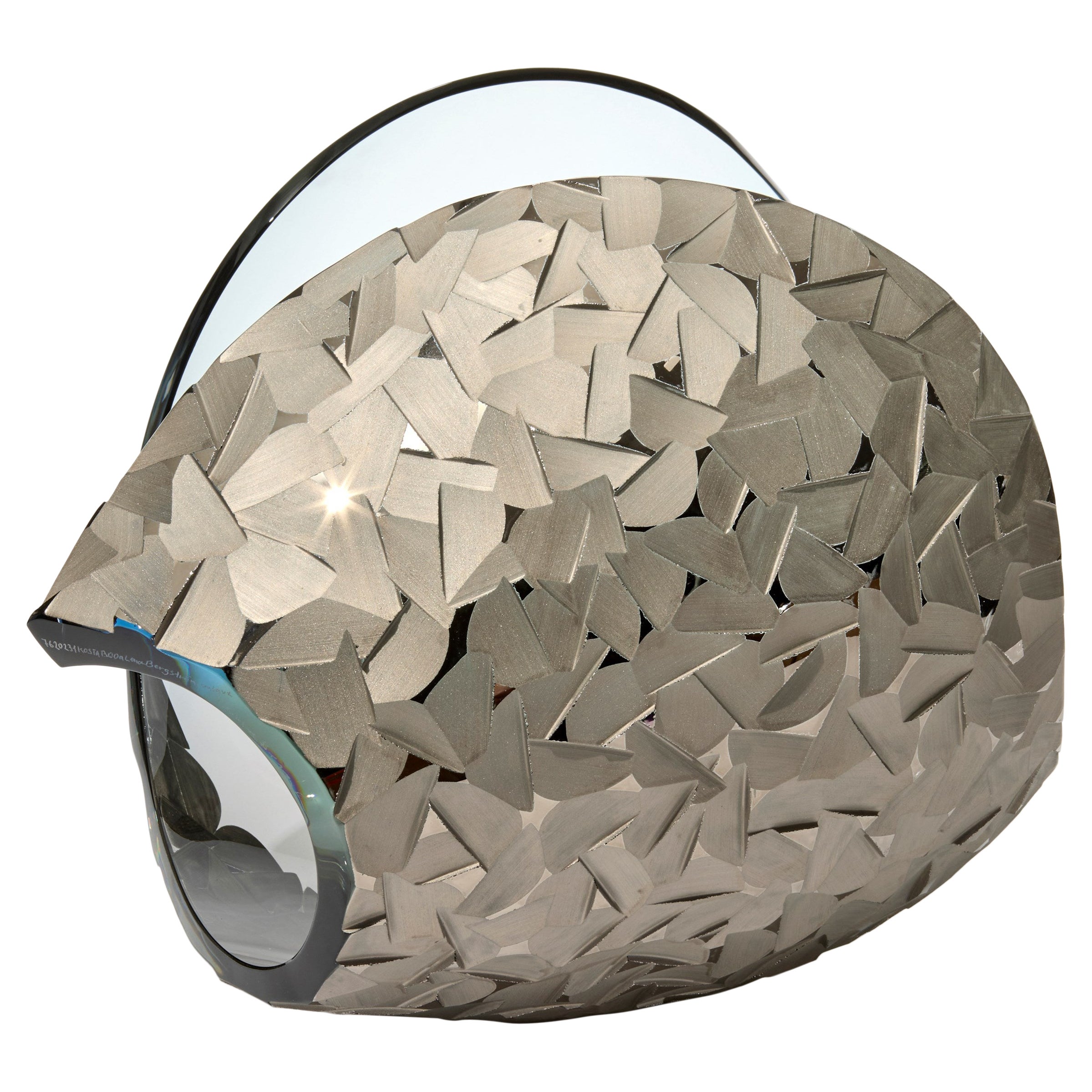 Planet in Faceted Platinum & Ice Blue, a cut glass sculpture by Lena Bergström