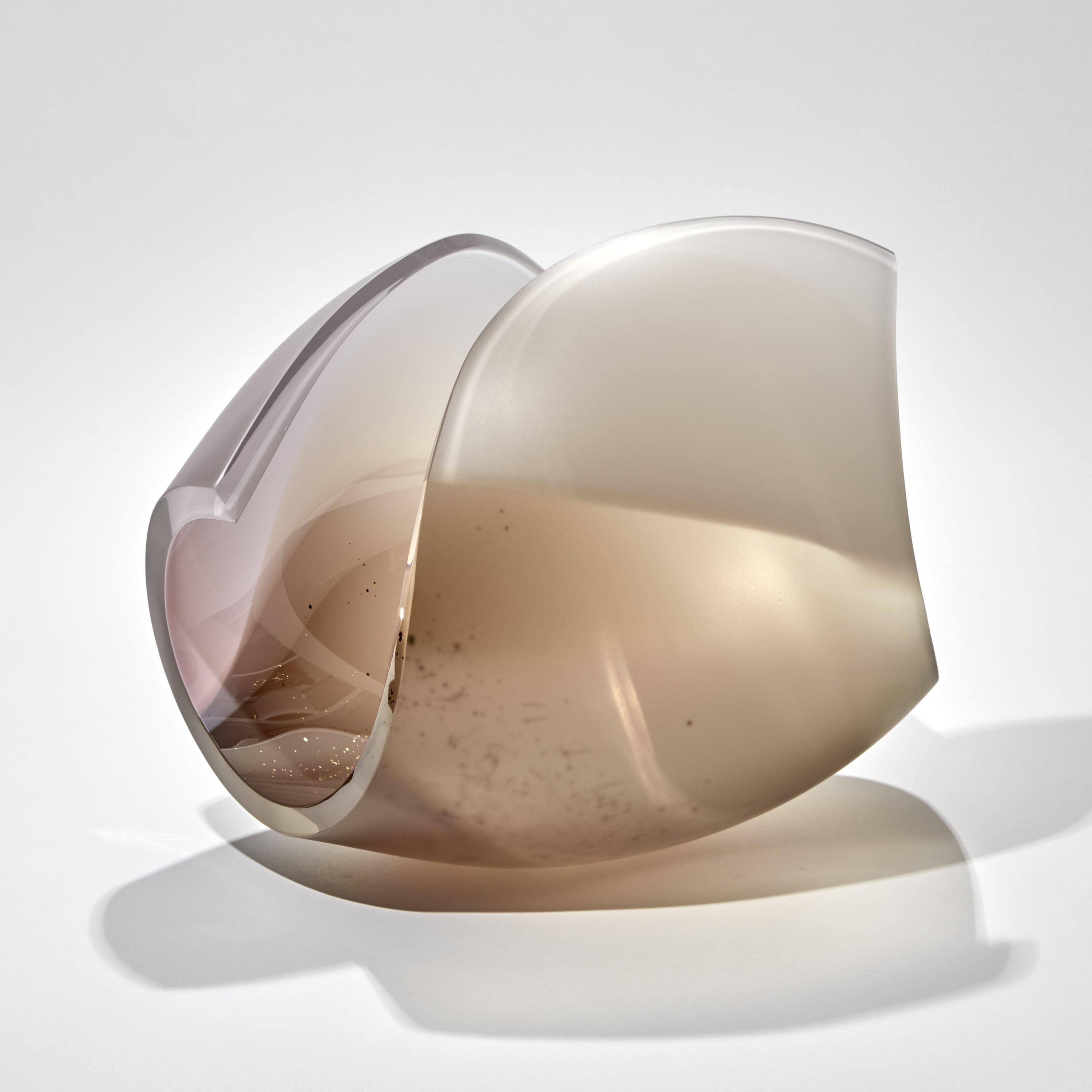 'Planet in Pink, Bronze & Gold' is a unique glass sculptural artwork and centerpiece by the Swedish artist Lena Bergström. This piece is from an ongoing collection of works called the Planets which the artist has revisited several times throughout