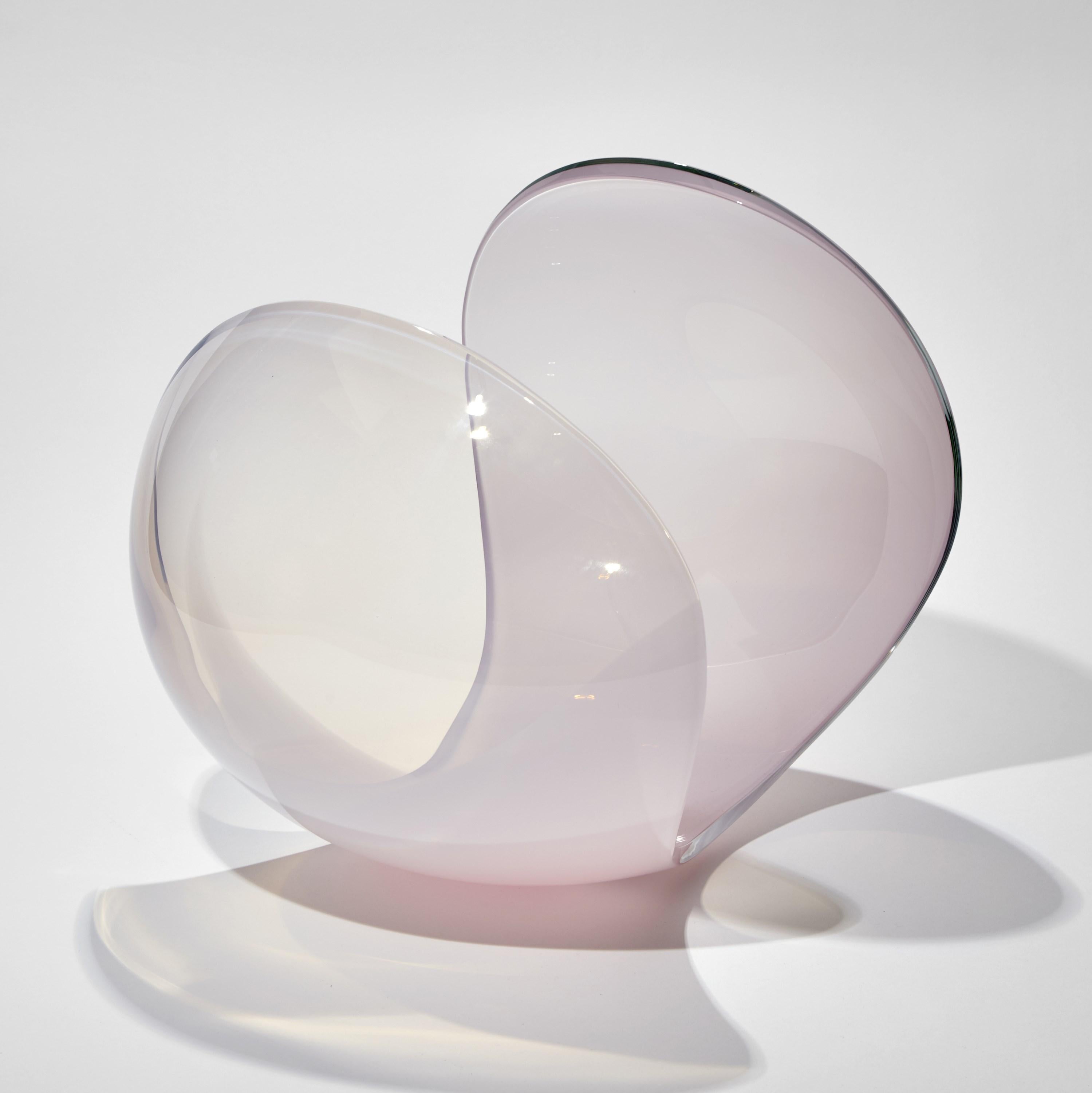 'Planet in Soft Pink' is a unique glass sculptural artwork and centerpiece by the Swedish artist Lena Bergström. This piece is from an ongoing collection of works called the Planets which the artist has revisited several times throughout her