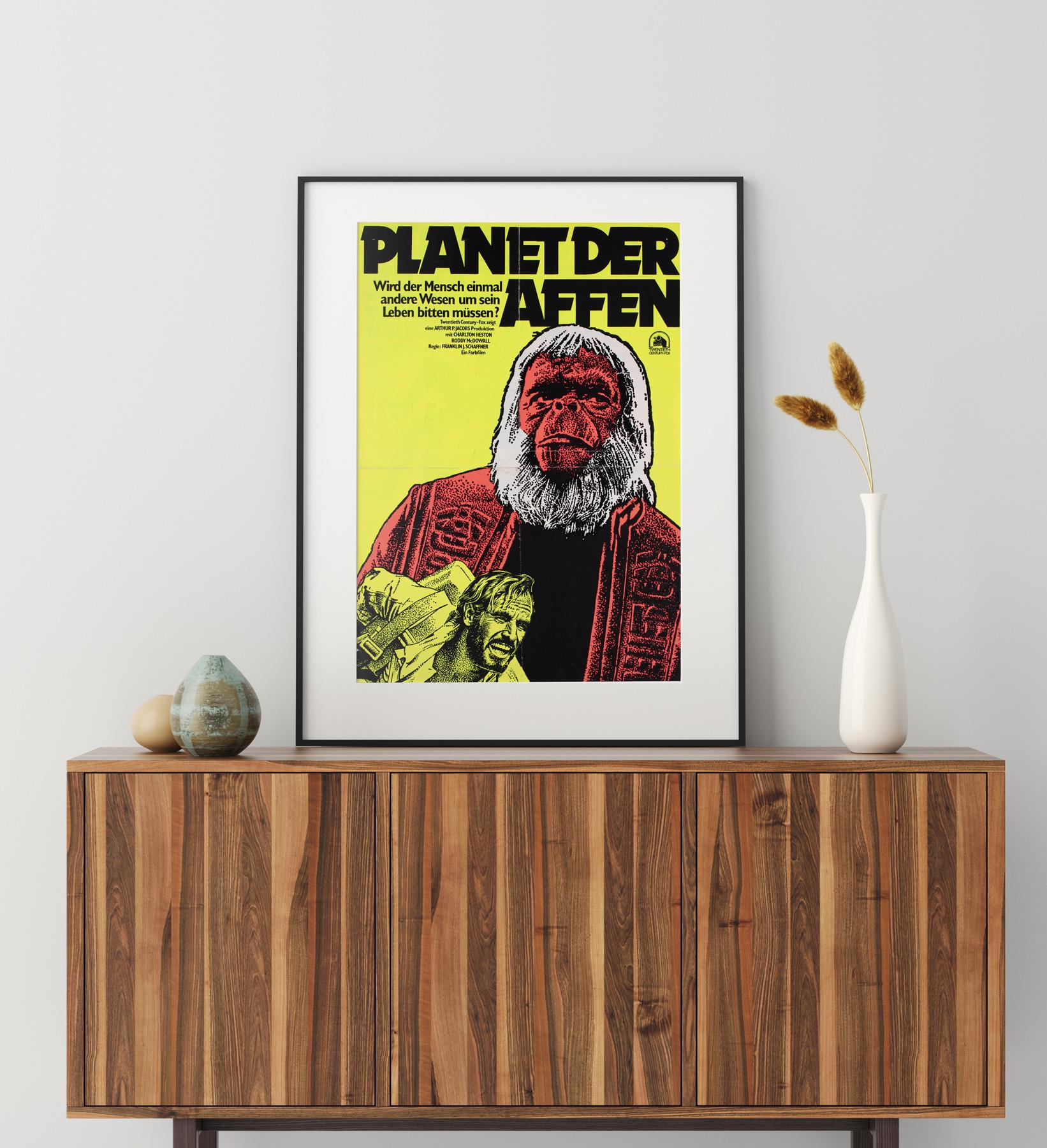 We love this original 1975  German re-release blacklight film poster for Planet of the Apes. Fantastic fluorescent day-glow colours which really pop under a black light/UV light (as shown in the last image). This poster is actually double-sided with