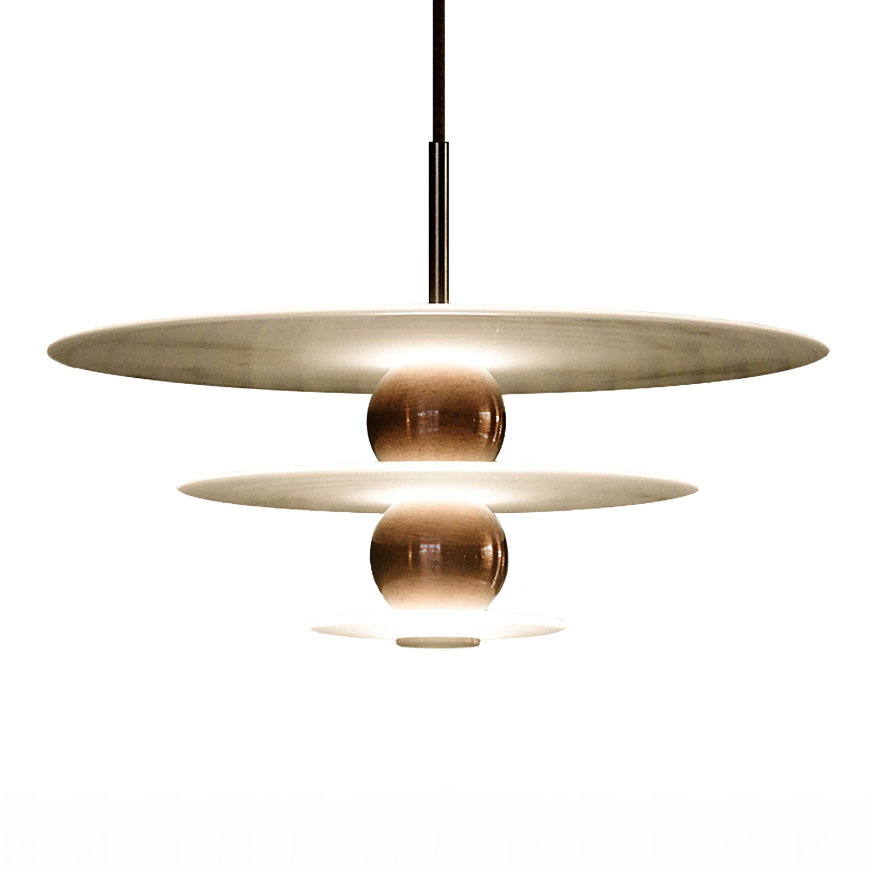 The Planetary Pendant is a contemporary and elegant design that emits a radiant glow. Can be used individually or in multiples to suit the space. 

The Planetary collection started life as a concept influenced by the rings of Saturn, which we