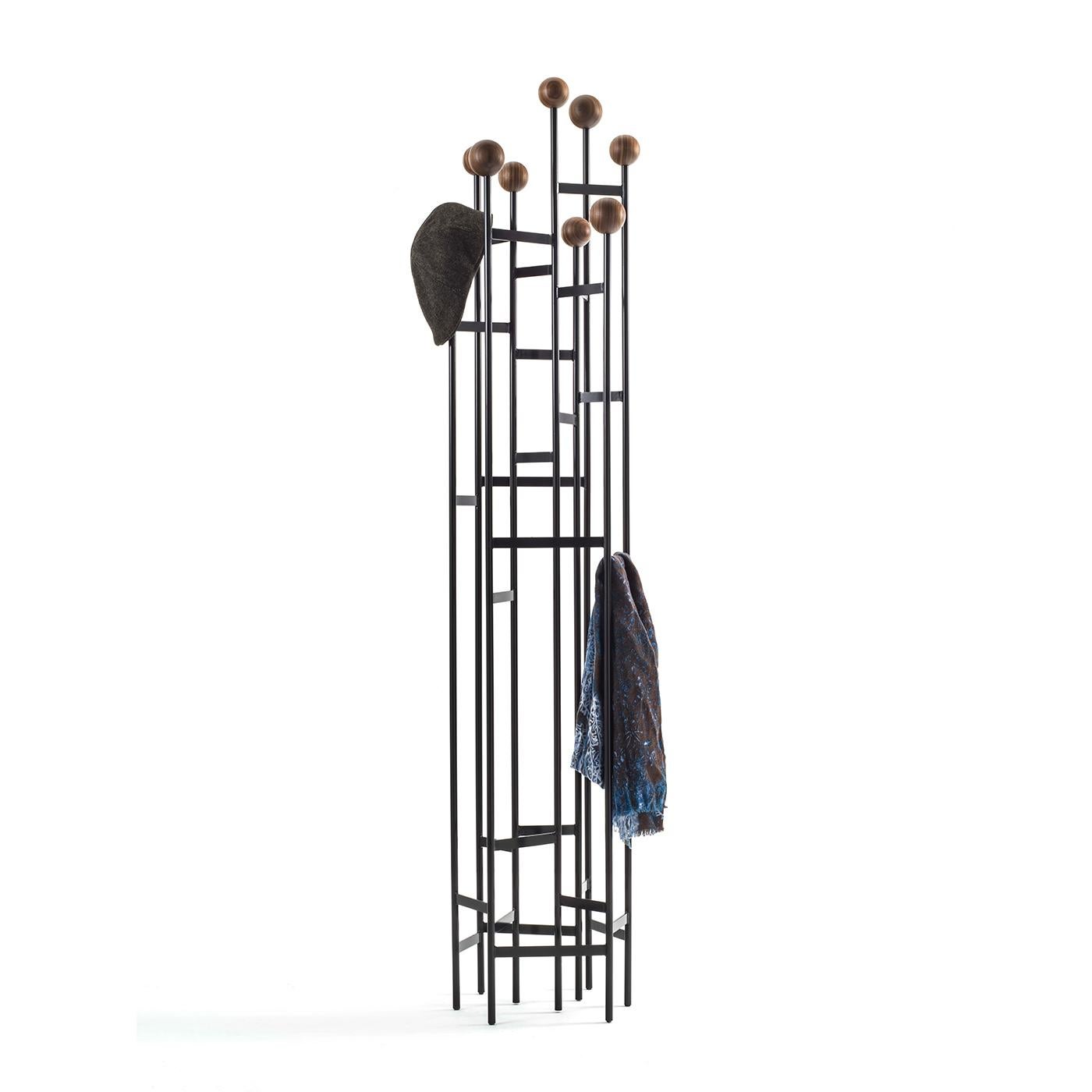 The Planets coat stand is an elegant and convenient addition to your hallway or living space. Made from metal in a black lacquer finish, it features solid wood spheres at the top of the posts for added character and style and furthermore to protect
