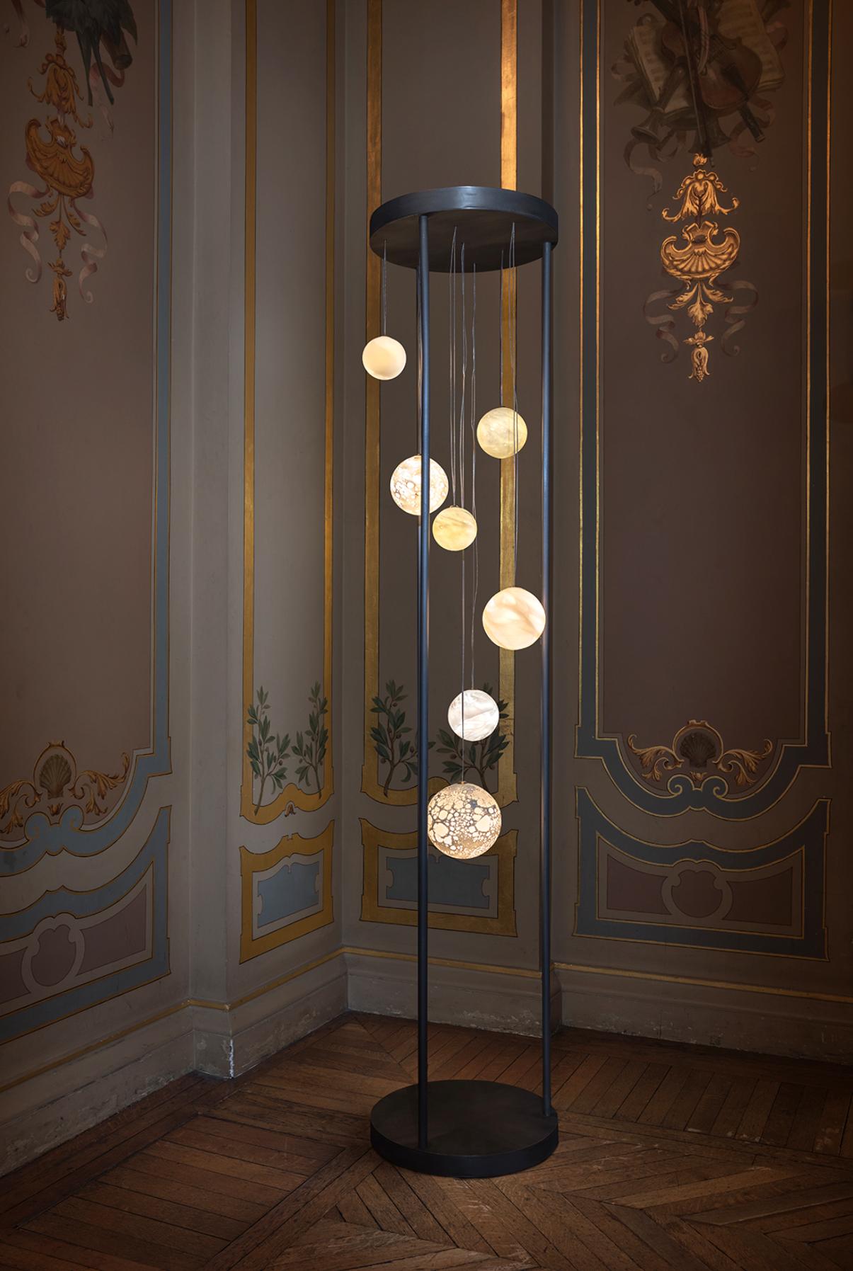 Planets floor lamp - Ludovic Clément d’Armont.
Blown glass and brass.
Dimensions: 220 x 55 x 55 cm.
Each creation is unique.

Ludovic Clément d’Armont is in the continuation of a family tradition of centuries of gentle glassmakers, painters,
