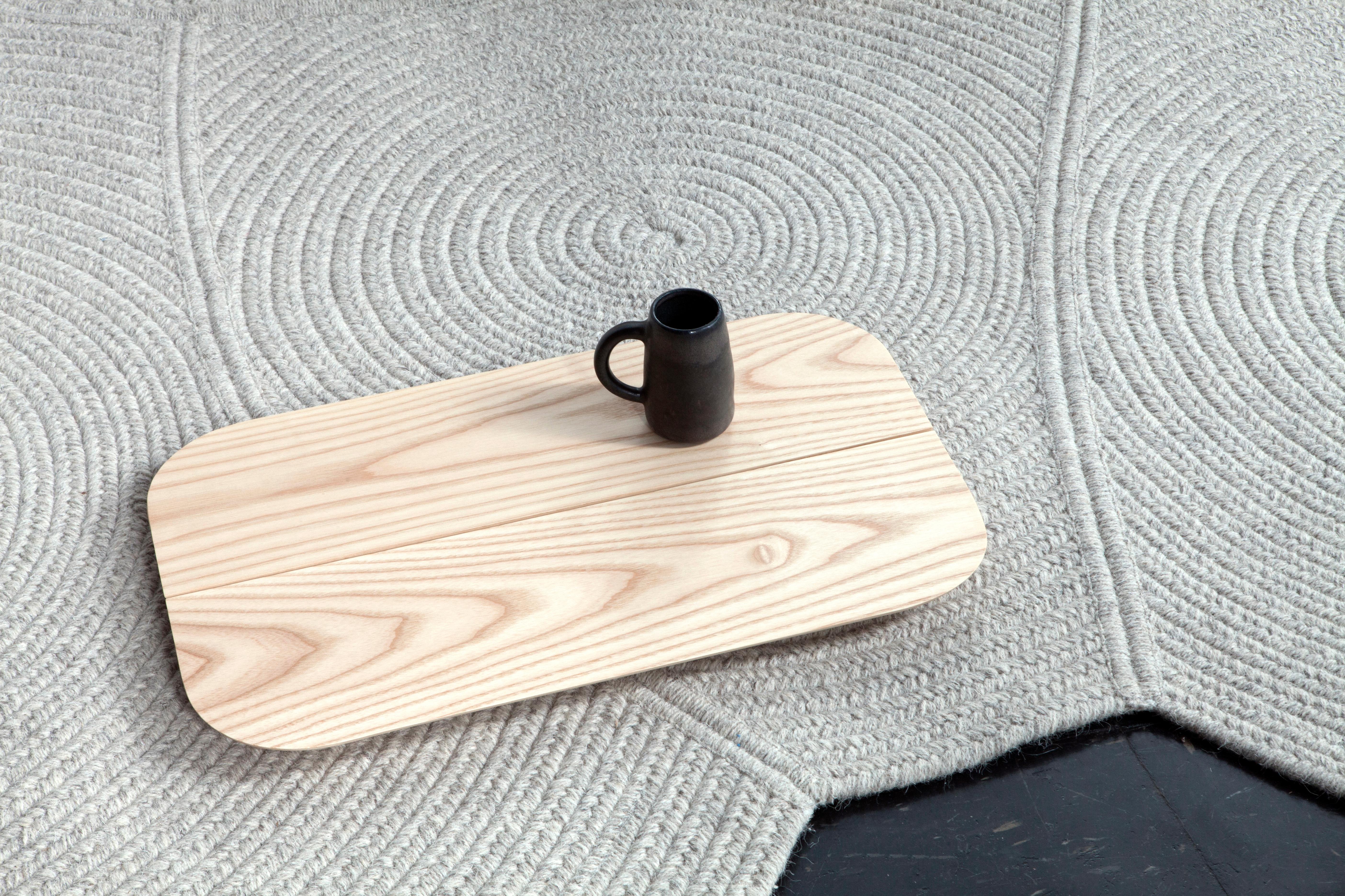 A beautifully simple and sturdy tray made in our studio from sustainably sourced ash. Use to serve food and drinks or as a low pedestal to display objects.

Dimensions:
Height: 1.25 in / 3 cm 
Width: 20 in / 51 cm
Depth: 12 in / 30.5