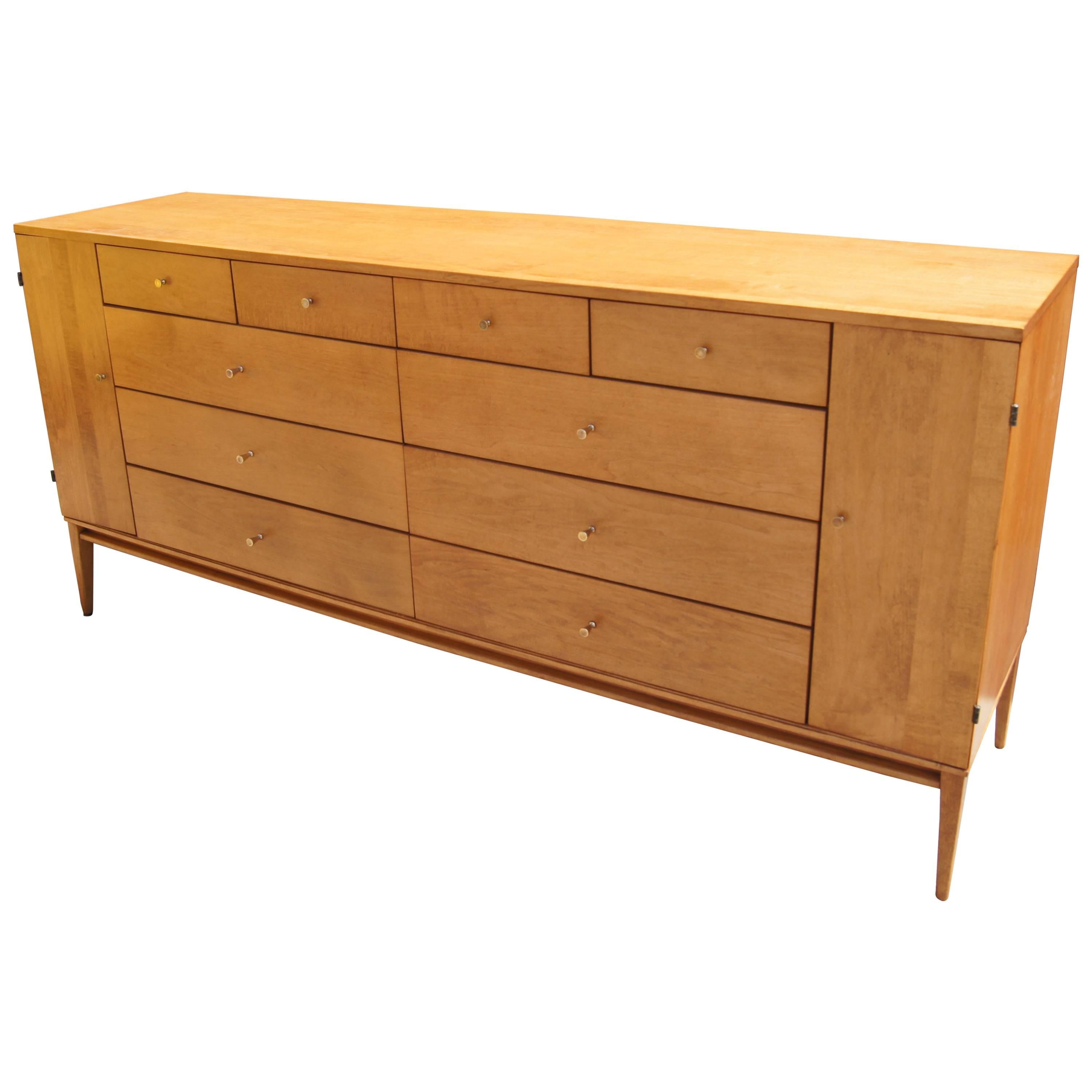 Planner Group 20-Drawer Maple Dresser by Paul Mccobb