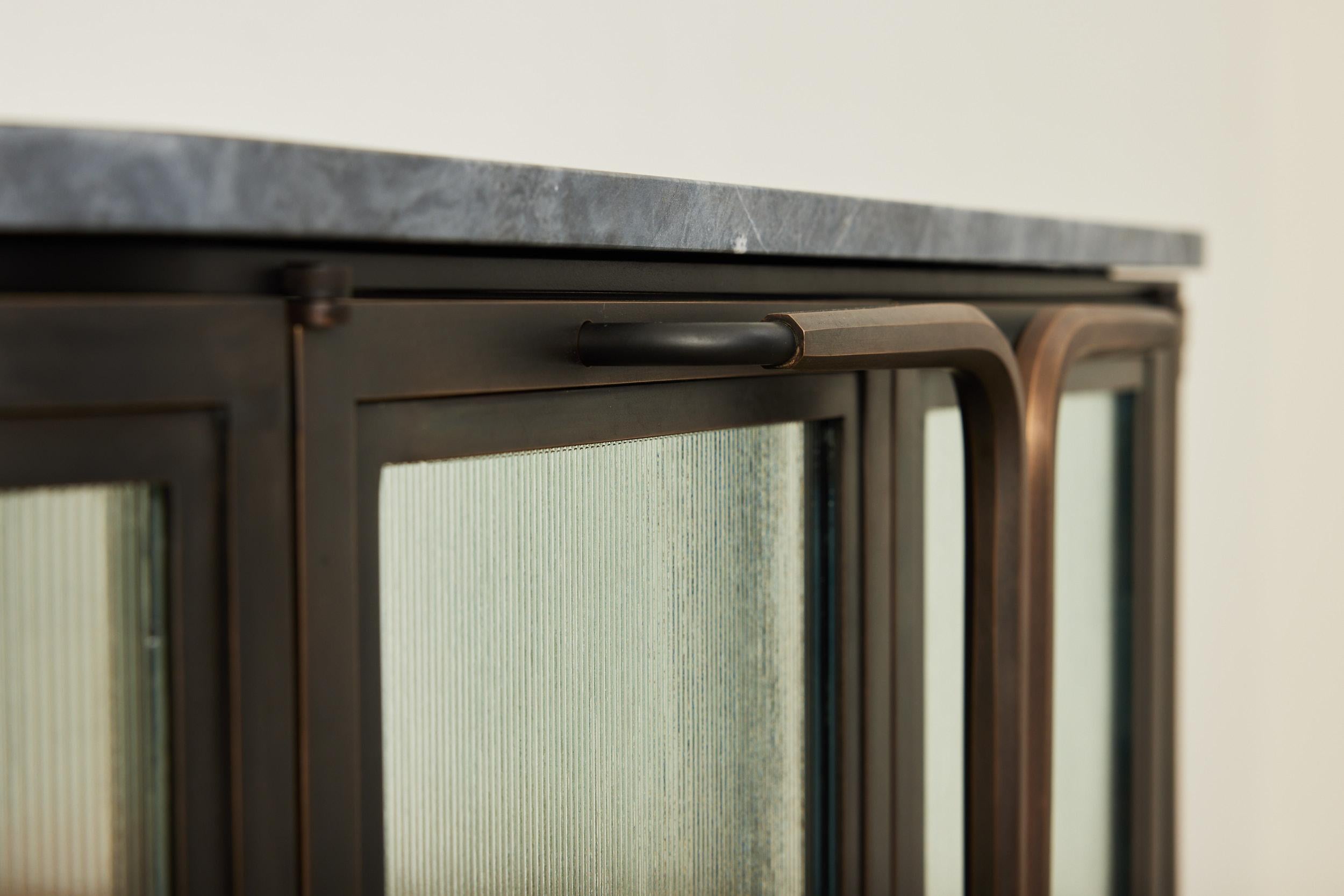 Hand-Crafted Plano Credenza (Two Door) in Bronze, Curved Glass Doors, Marble Top For Sale