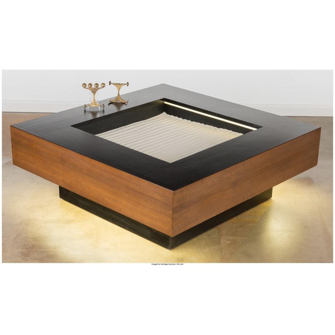 An incredible coffee table by Hugh Spencer, designed and created in the 1960s this table was made for the executive office to provide a bit of zen throughout the work day.  Included are 2 brutalist styled tools that allow you to rake and groom the